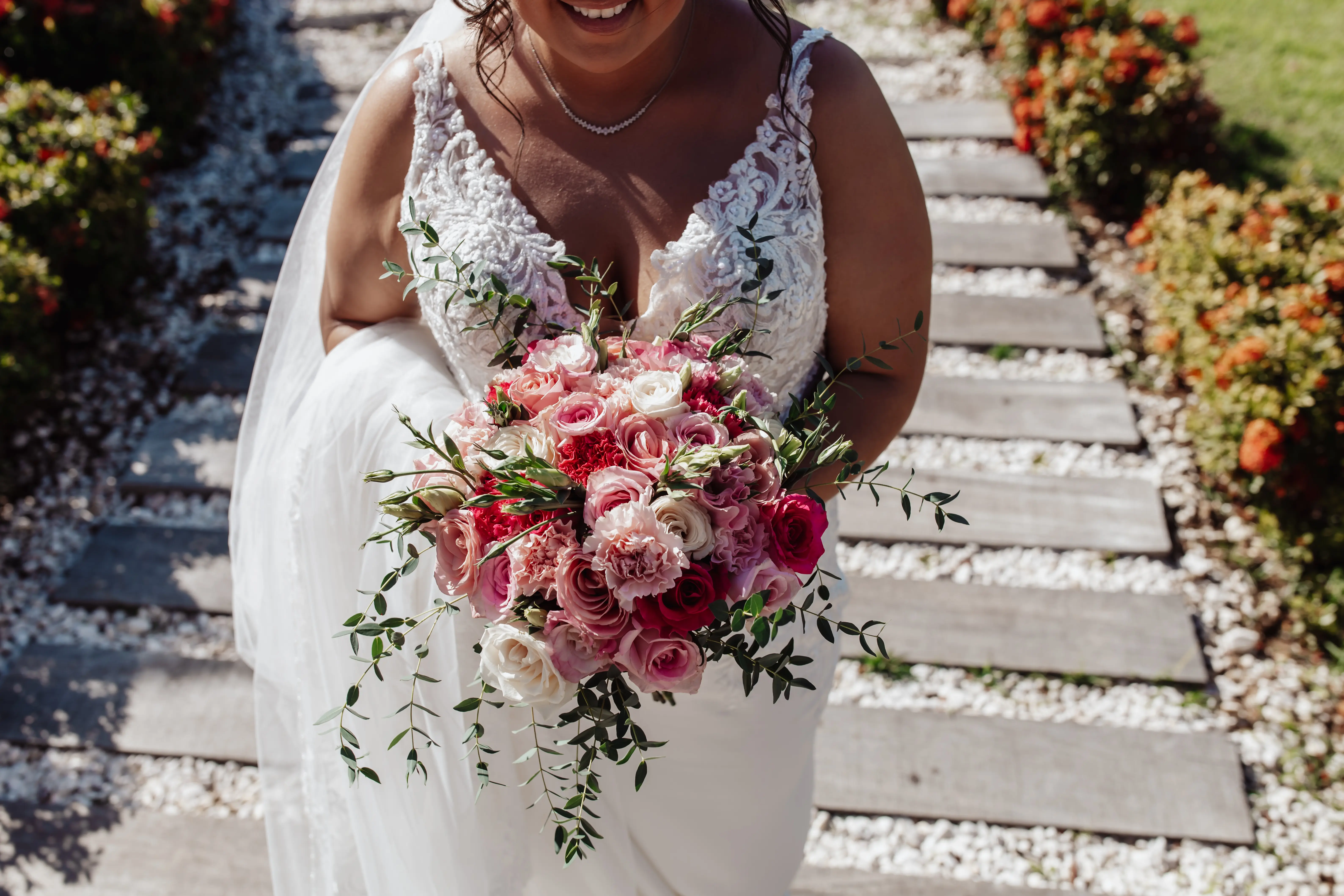 Bride wearing Johanna Lane by Maggie Sottero and her bouquet