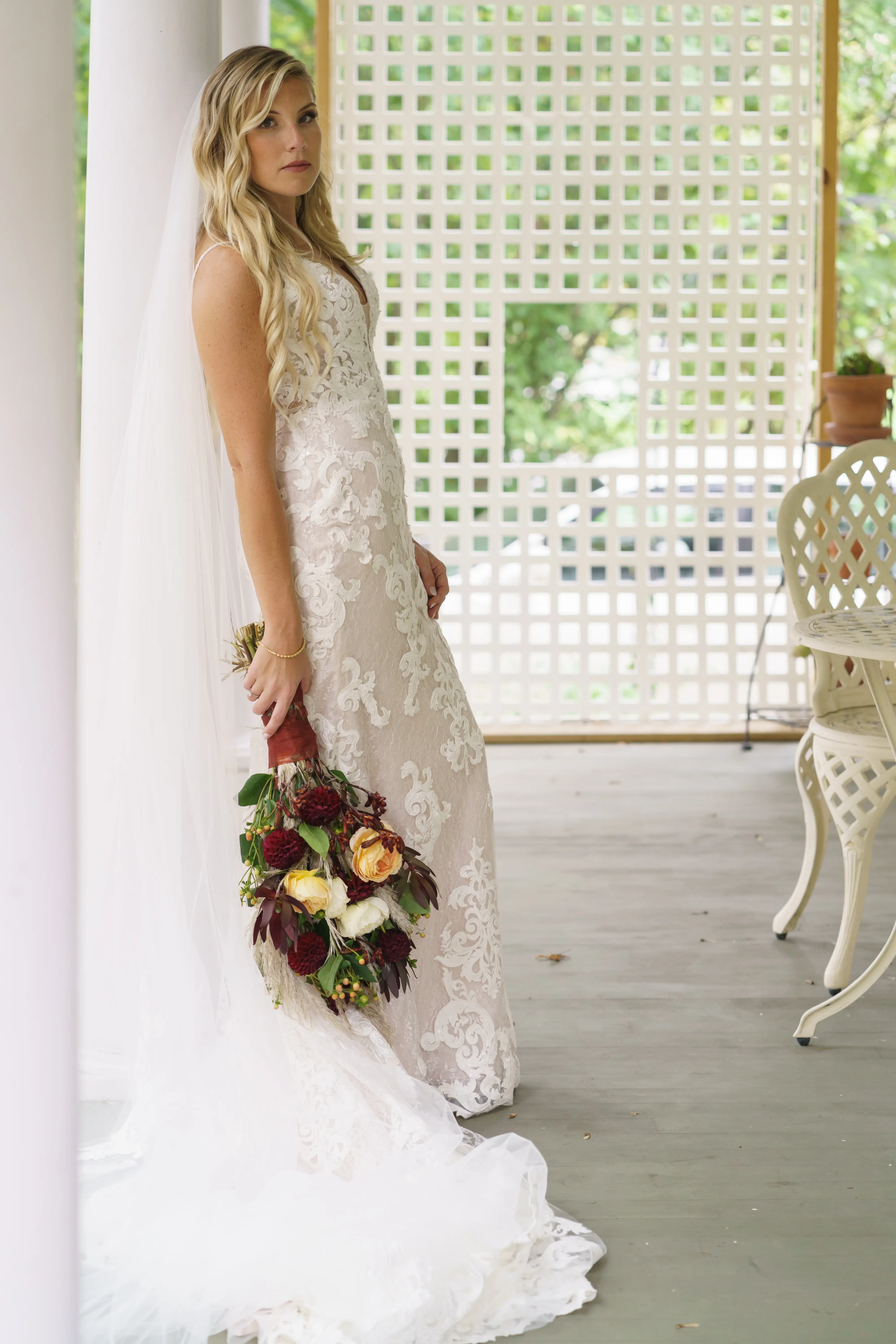 Bride wearing Lace Sheath Wedding Dress called Tuscany Lynette by Maggie Sottero