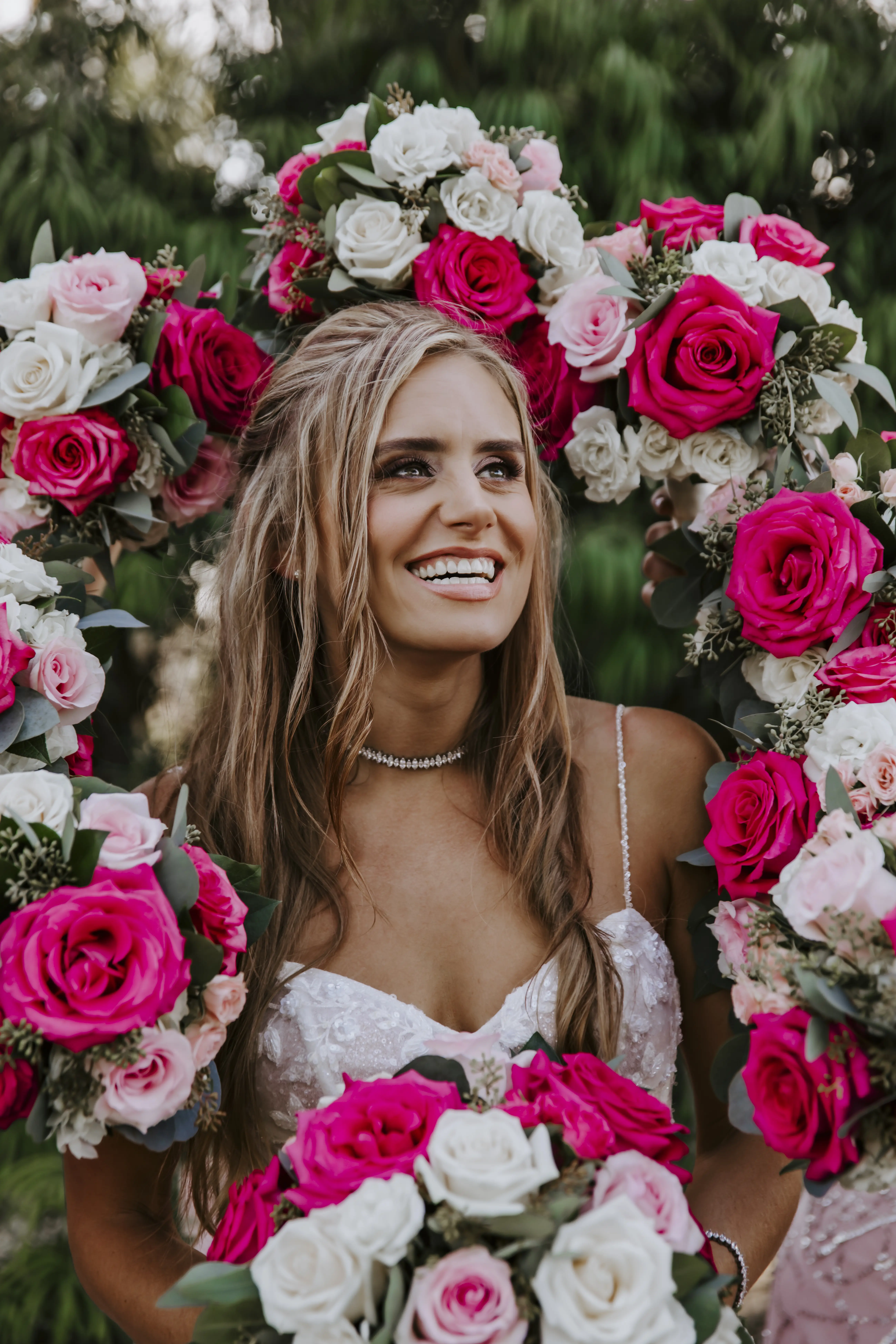 Bride Wearing Sparkly Ballgown Wedding Dress Called Shasta By Sottero And Midgley With Pink And White Rose Bouquets Surrounding Her