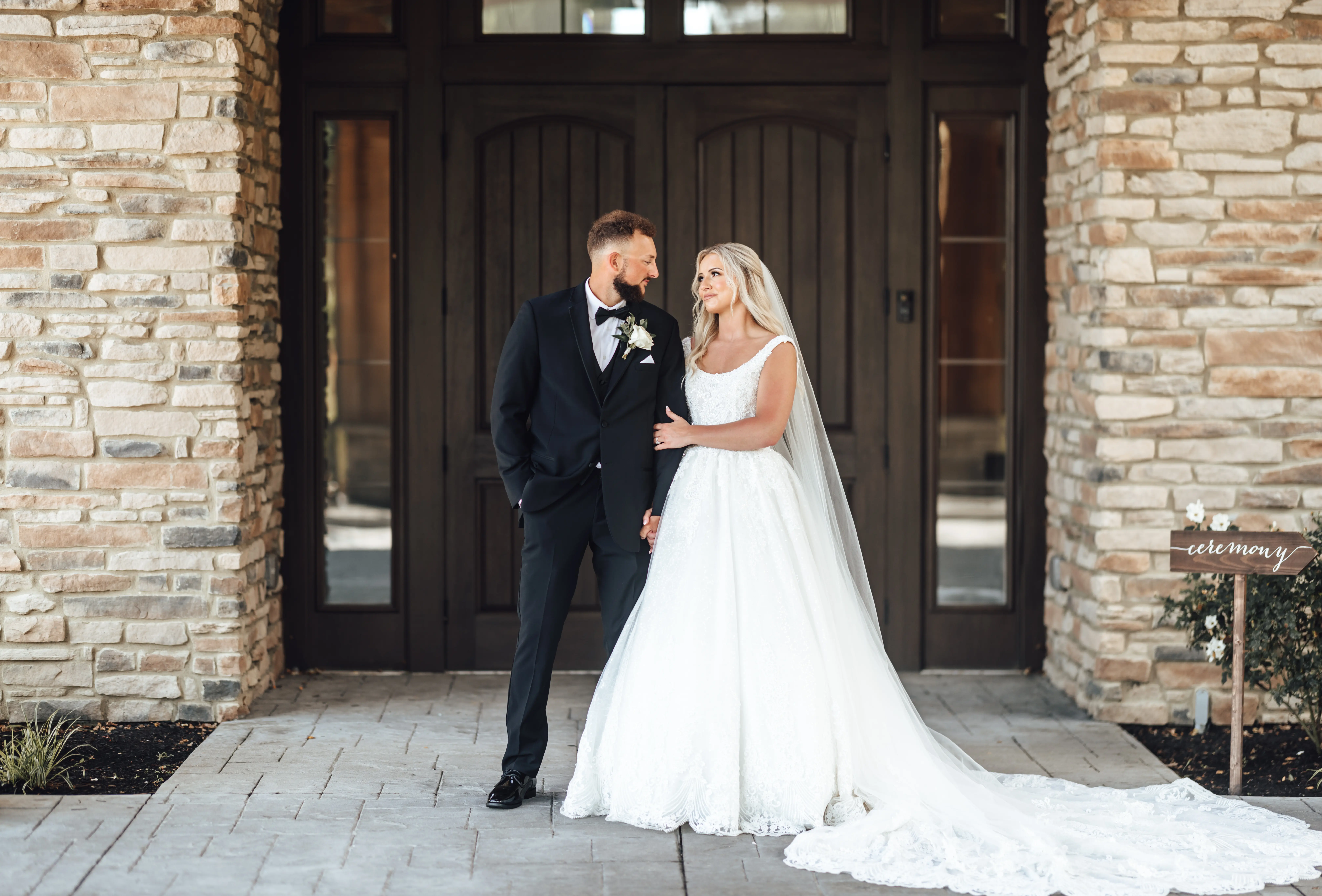 Groom With Bride Wearing Lace Ballgown Zachary By Sottero And Midgley