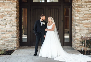Groom With Bride Wearing Lace Ballgown Zachary By Sottero And Midgley