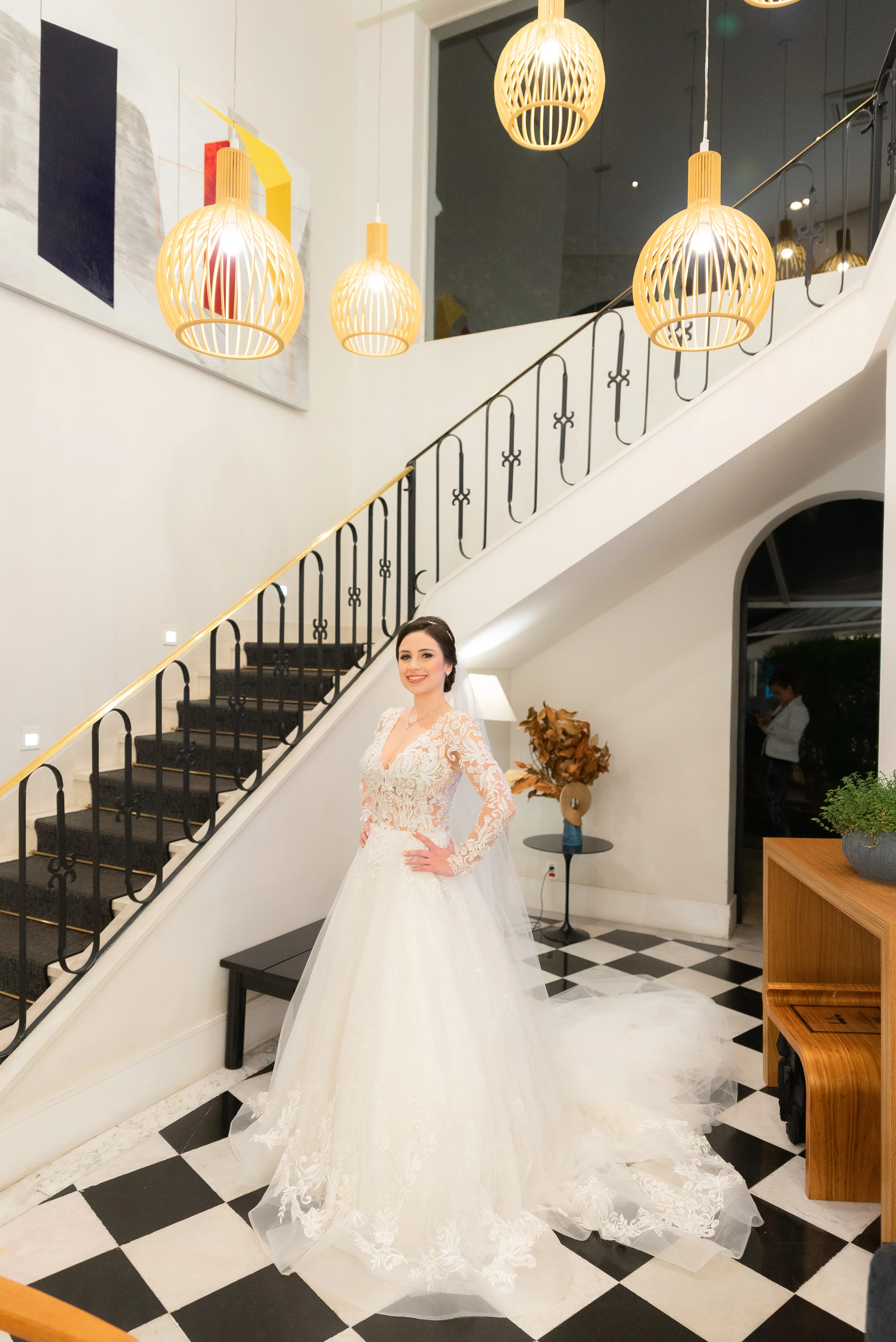 Bride Smiling While Wearing Lace A-Line Wedding Dress Called Zander By Sottero And Midgley In A Modern Venue