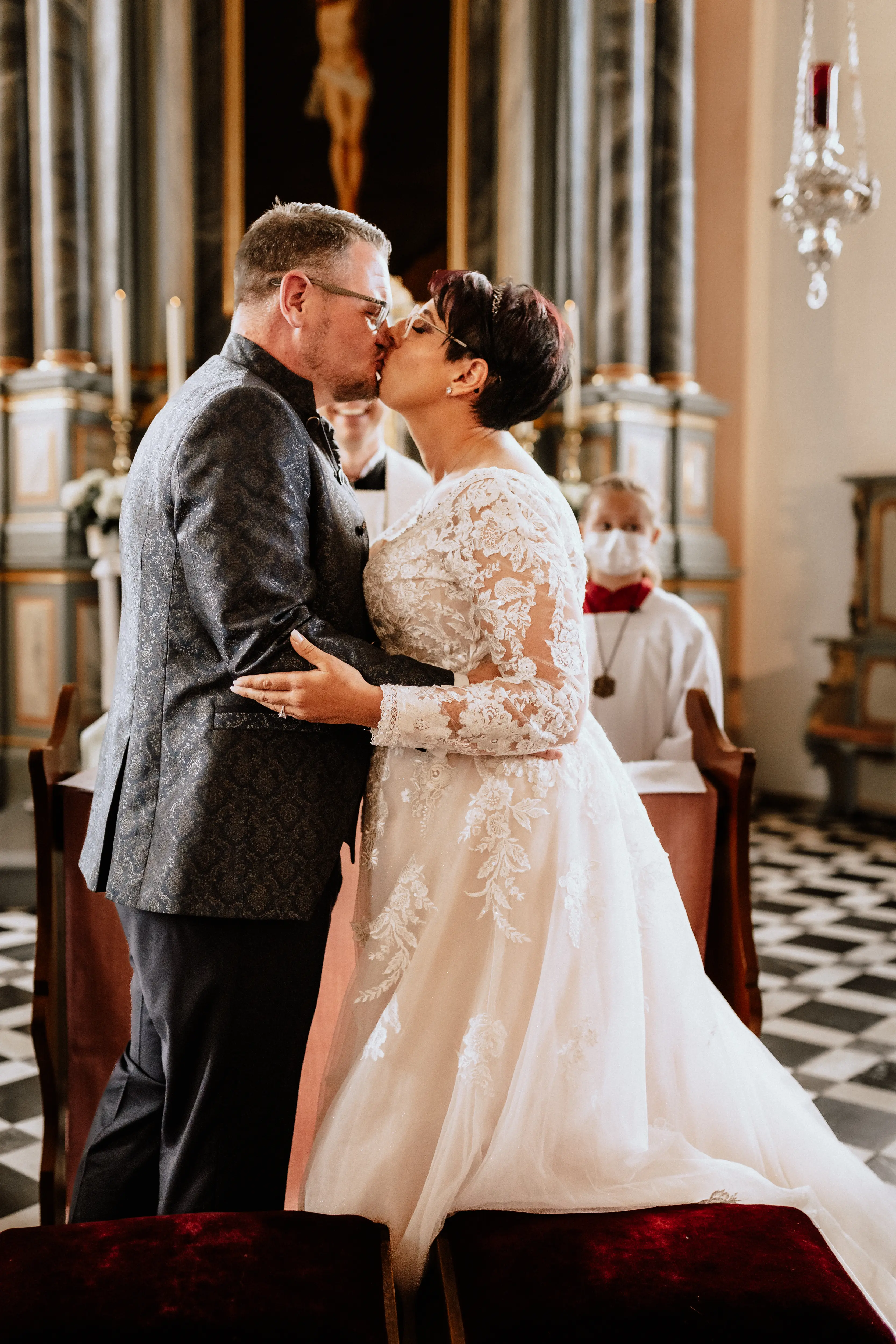 Bride in Long Sleeve Ivory Wedding Dress Raphael with Groom