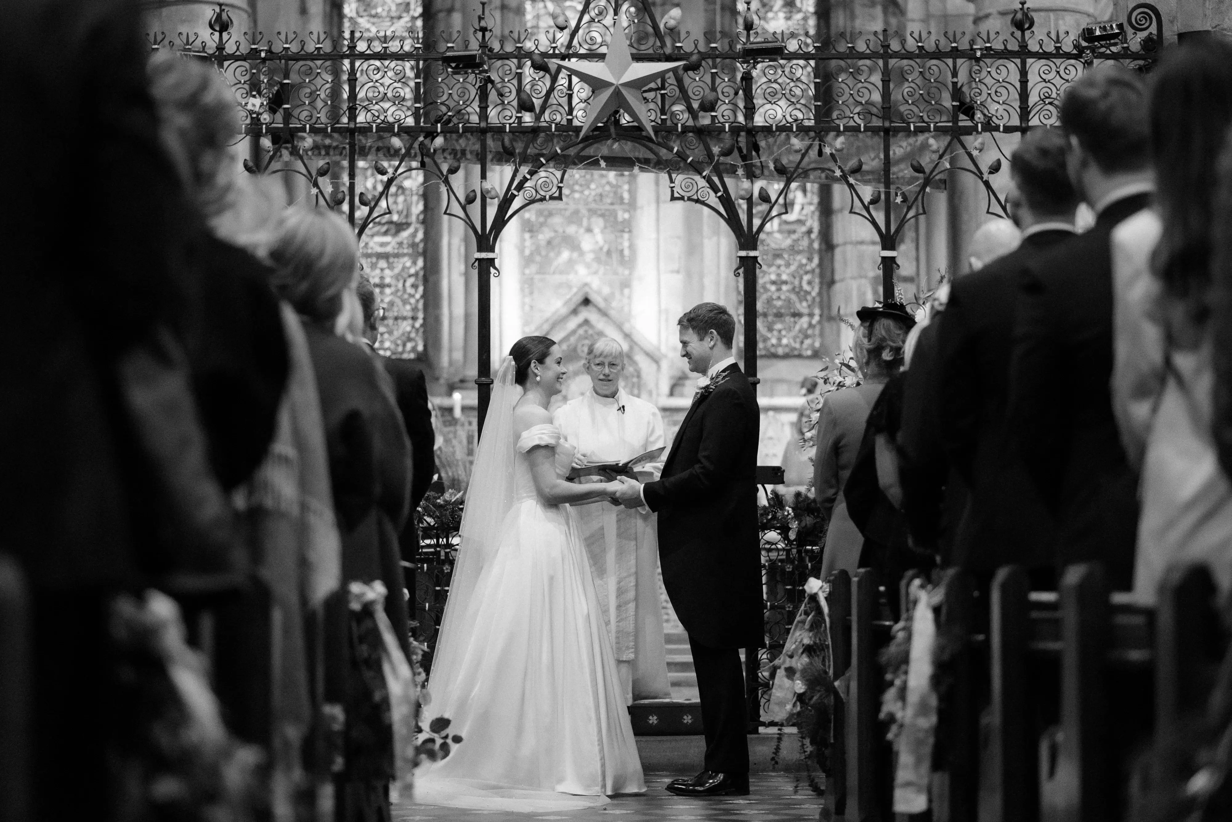 Bride wearing Scarlet wedding dress by Maggie Sottero during her wedding ceremony
