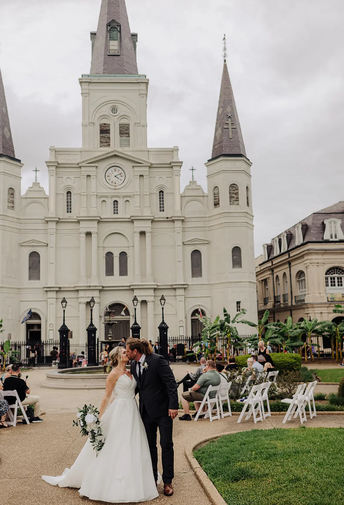 Bride Wearing Modern Princess Wedding Dress Called Aubrielle By Maggie Sottero Kissing Groom At A New Orleans Wedding