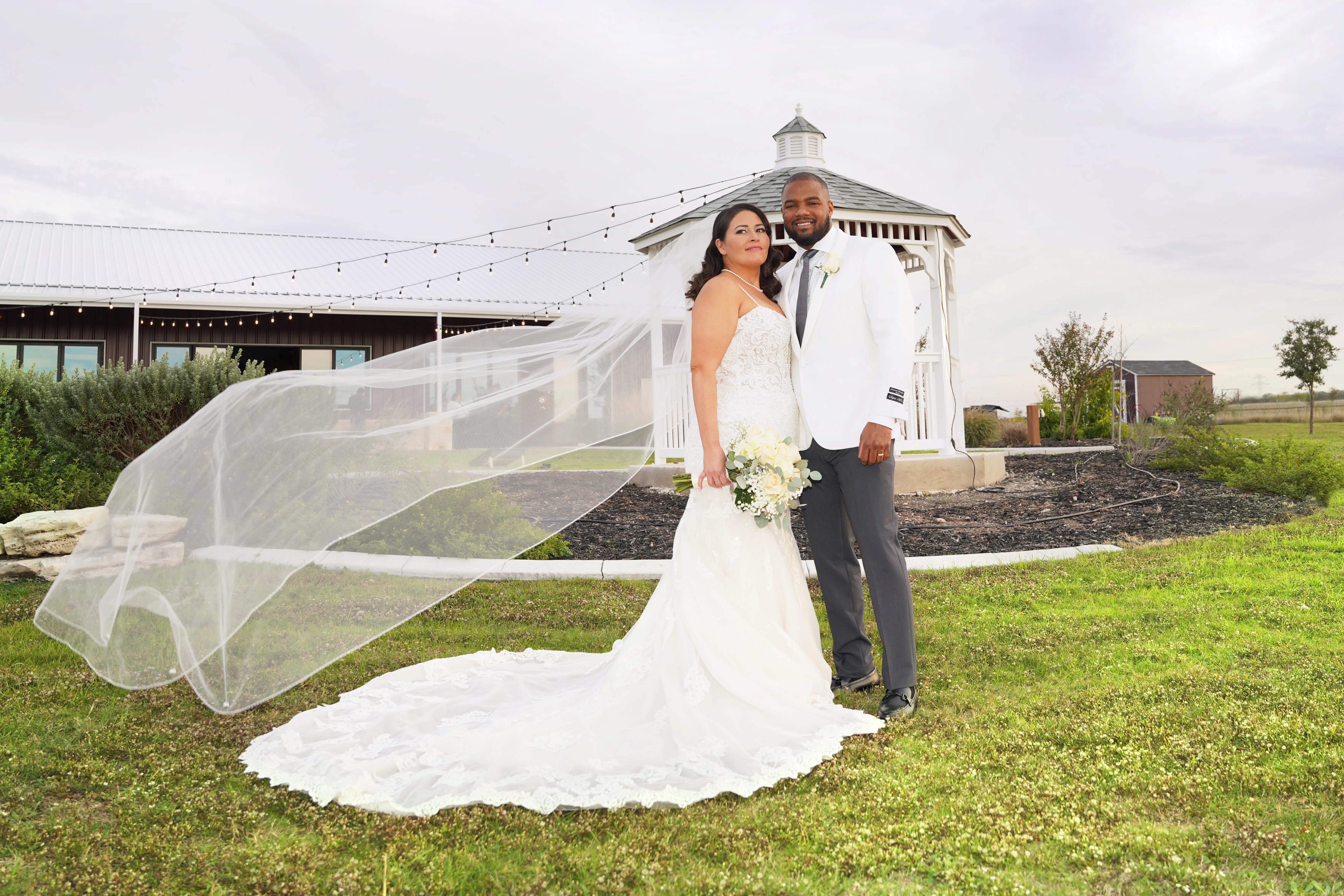 Bride wearing Fiona by Maggie Sottero with her husband