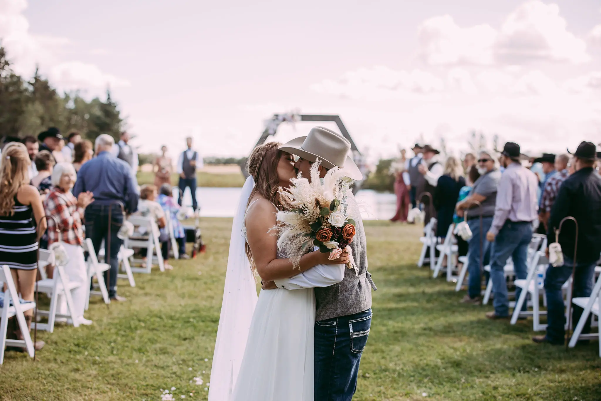 Groom With Bride Wearing Beaded Chiffon Sheath Wedding Dress Lorraine By Rebecca Ingram