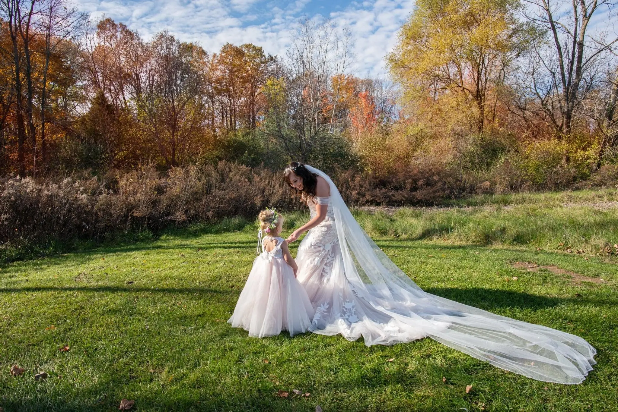 Flower Girl with Bride in Strapless Mermaid Bridal Gown with Sweetheart Neckline Called Hattie by Rebecca Ingram