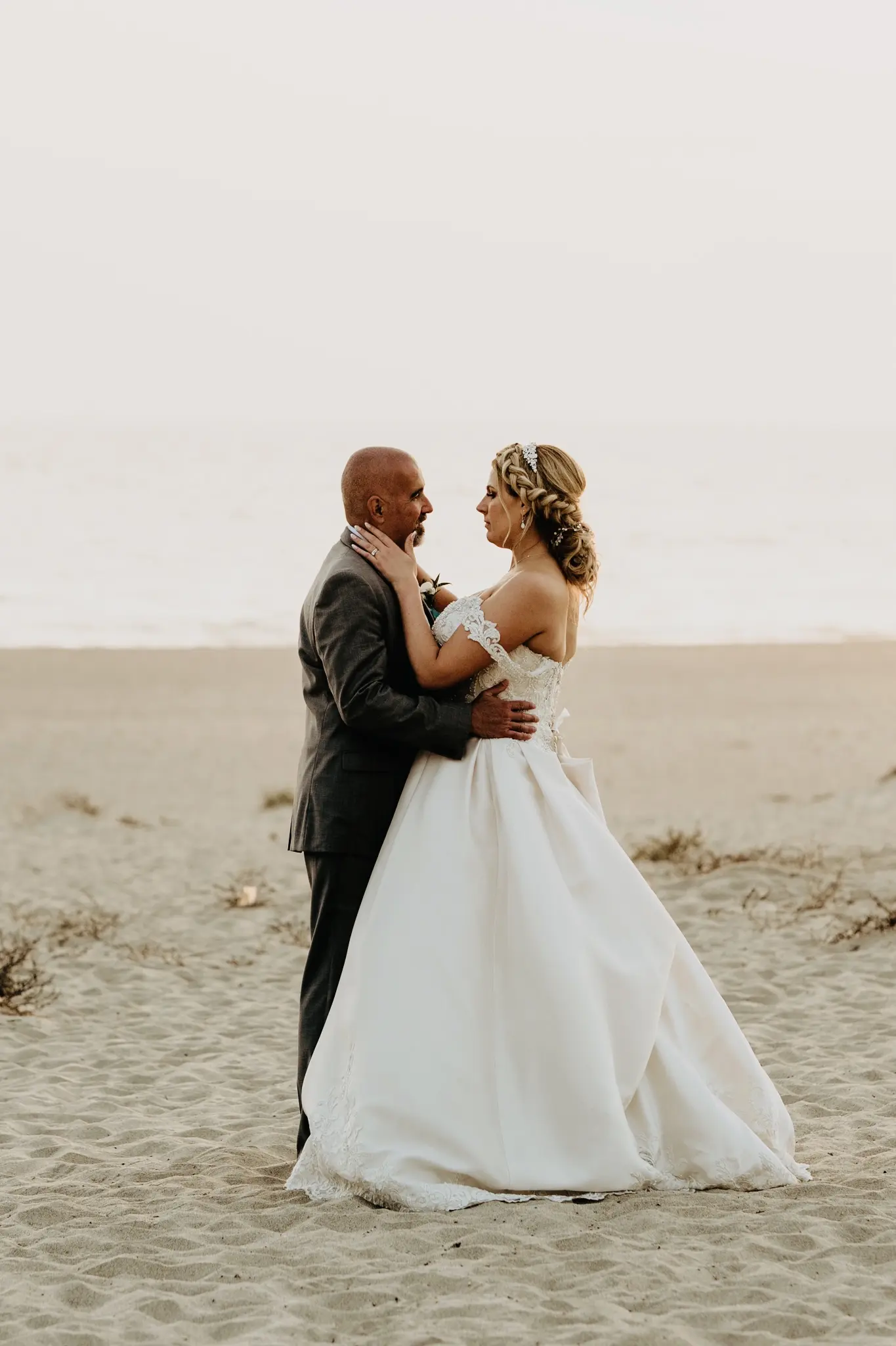 Groom With Bride Wearing Satin Ballgown Kimora By Sottero And Midgley