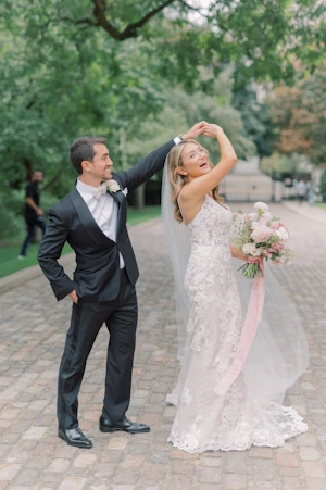 Bride Wearing A Lace Sheath Wedding Gown Named Tuscany Lynette By Maggie Sottero Bride Dancing With Groom