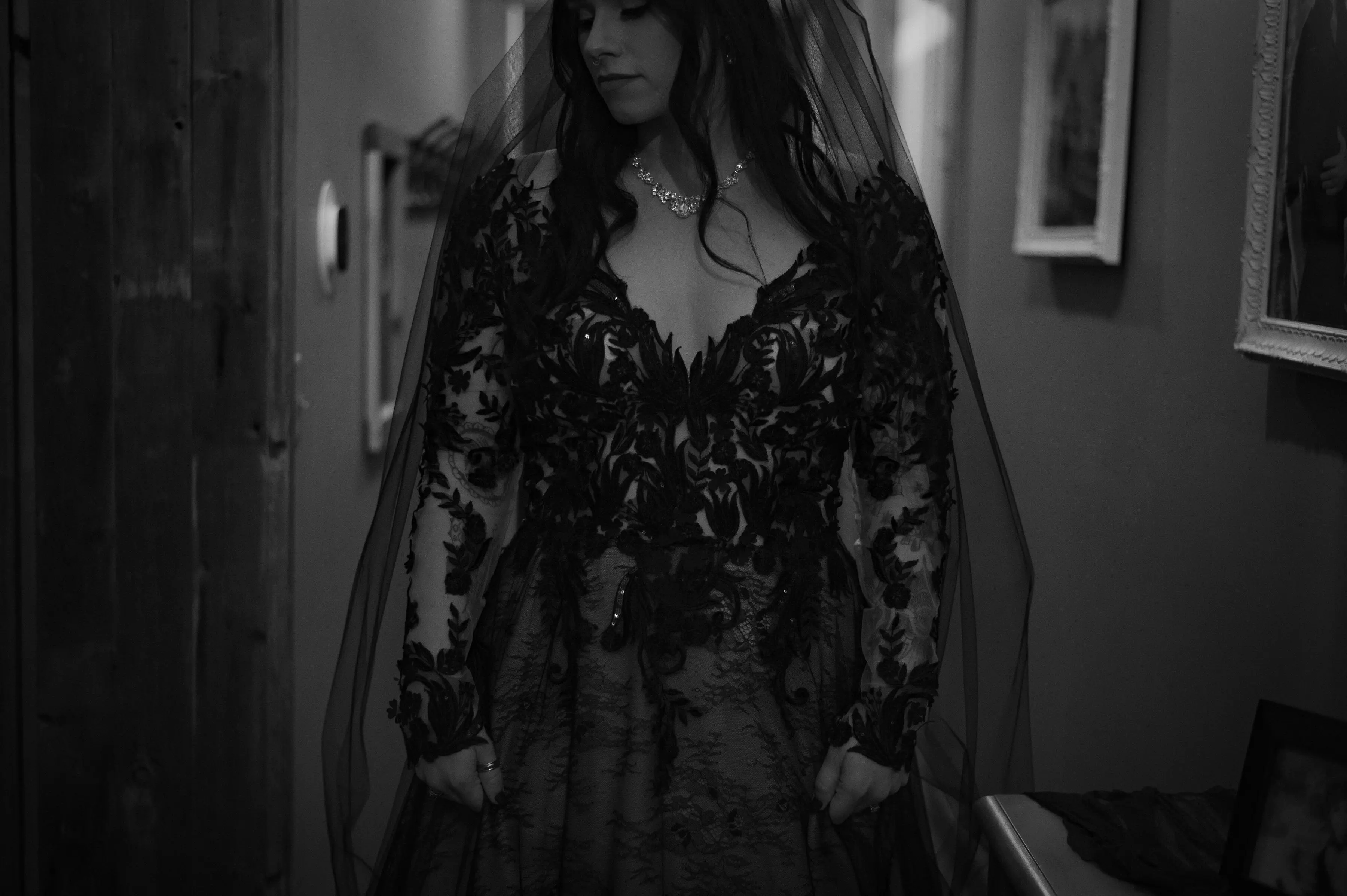 Bride Wearing Black Lace Wedding Dress Called Zander By Sottero And Midgley With Veil