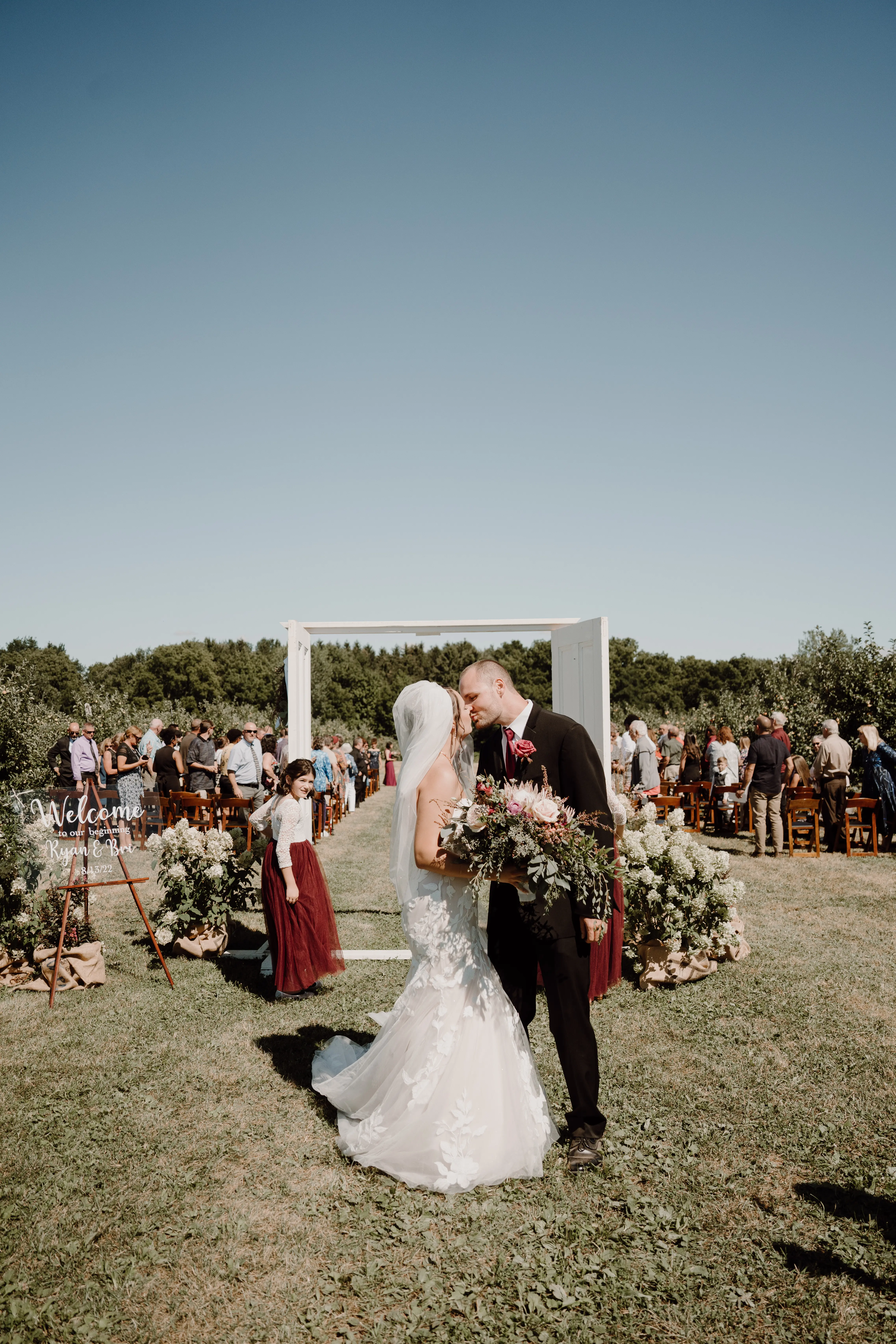 Groom With Bride Wearing Mermaid Wedding Dress With Oversized Lace Hattie By Rebecca Ingram
