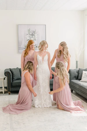 Bride wearing lace sheath wedding dress