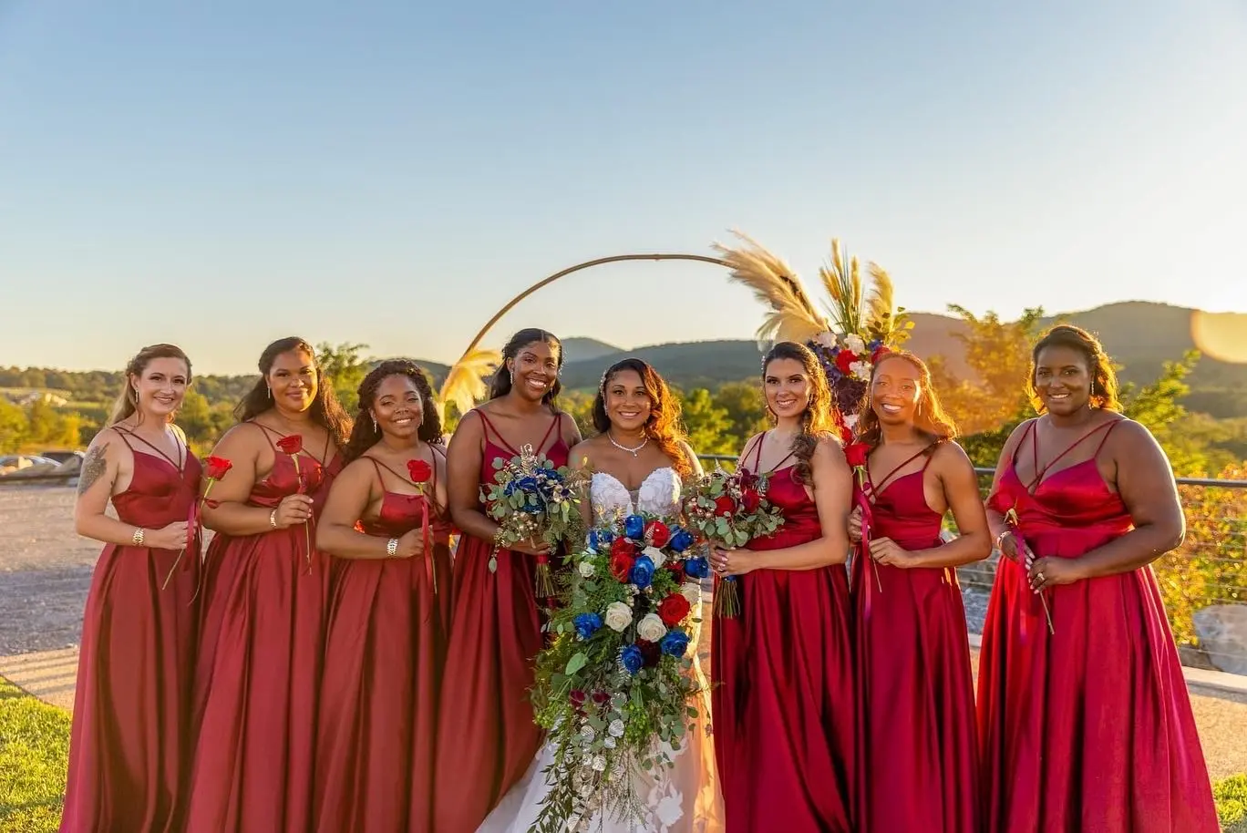 Pregnant Bride In Mermaid Wedding Dress Called Hattie By Rebecca Ingram Bridesmaids In Red
