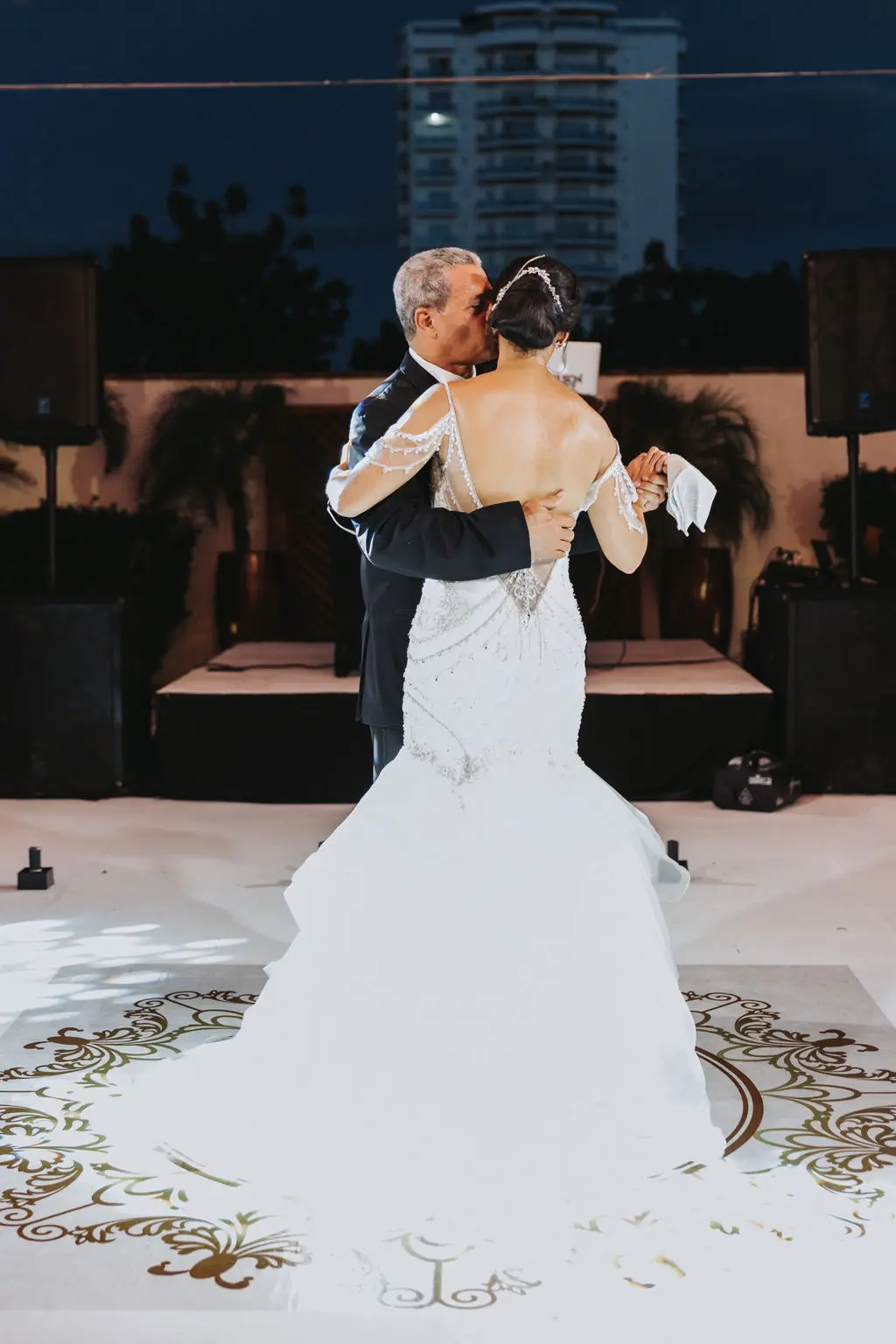 Bride wearing glamorous mermaid wedding dress