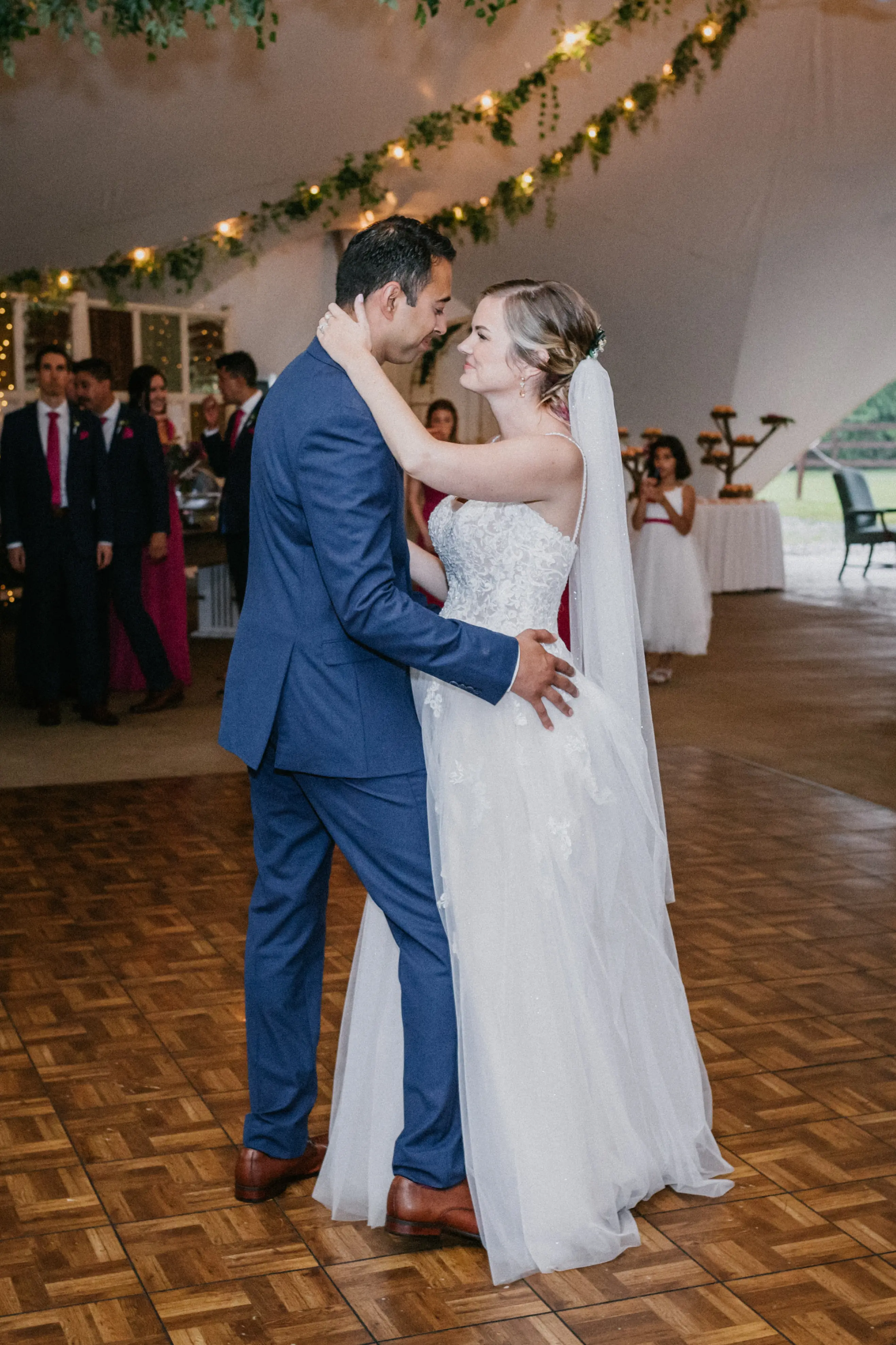 Groom With Bride Wearing A-Line Lace Wedding Dress Marisol By Rebecca Ingram
