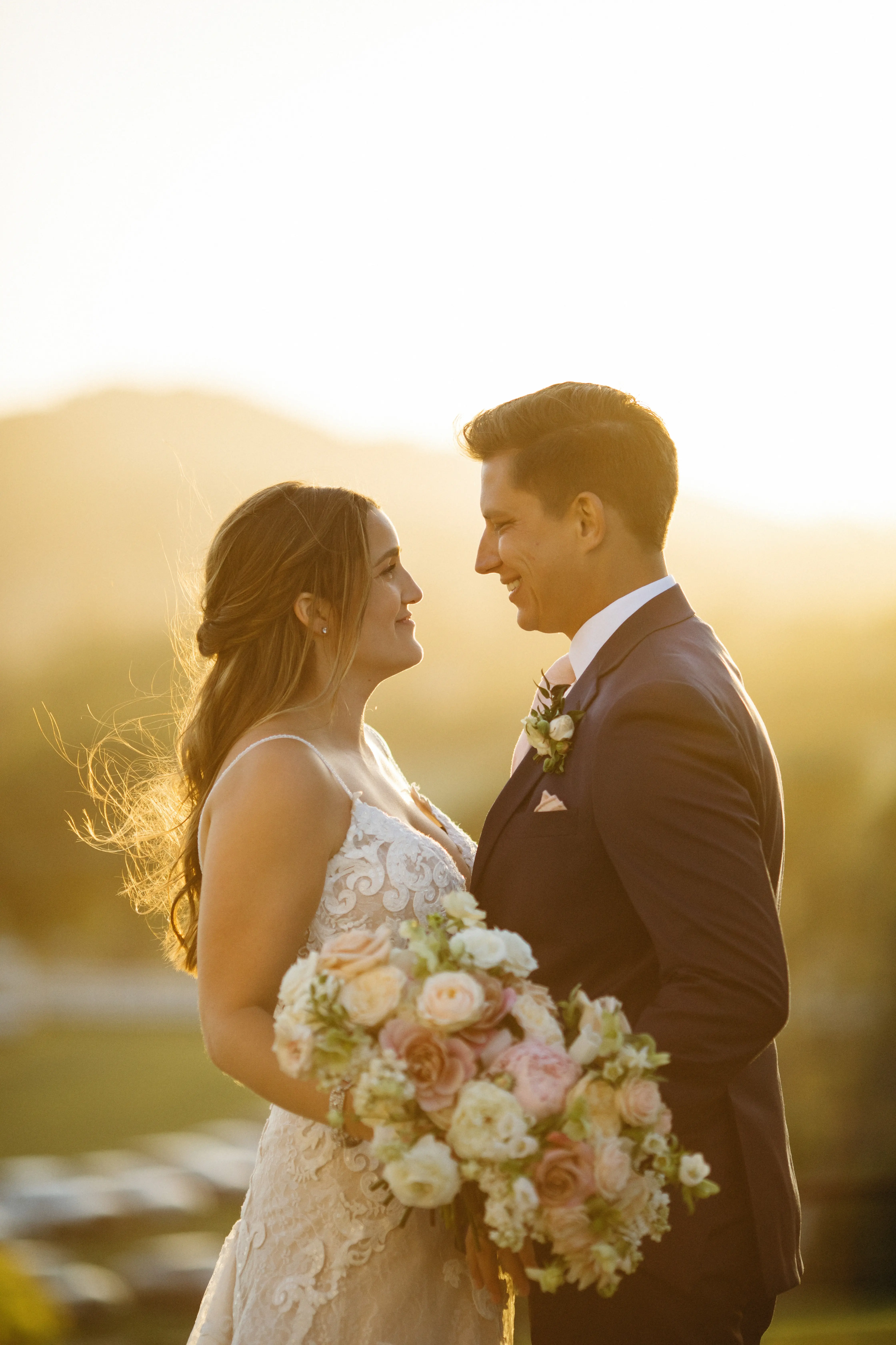 Bride with groom wearing romantic, A-line wedding dress