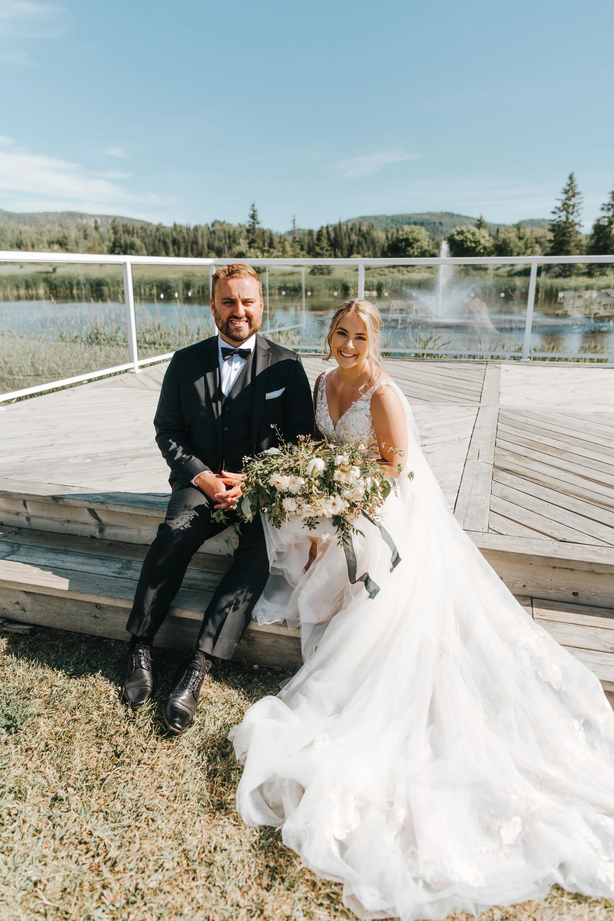 Groom With Bride Wearing V-Neck A-Line Wedding Dress Minerva By Rebecca Ingram