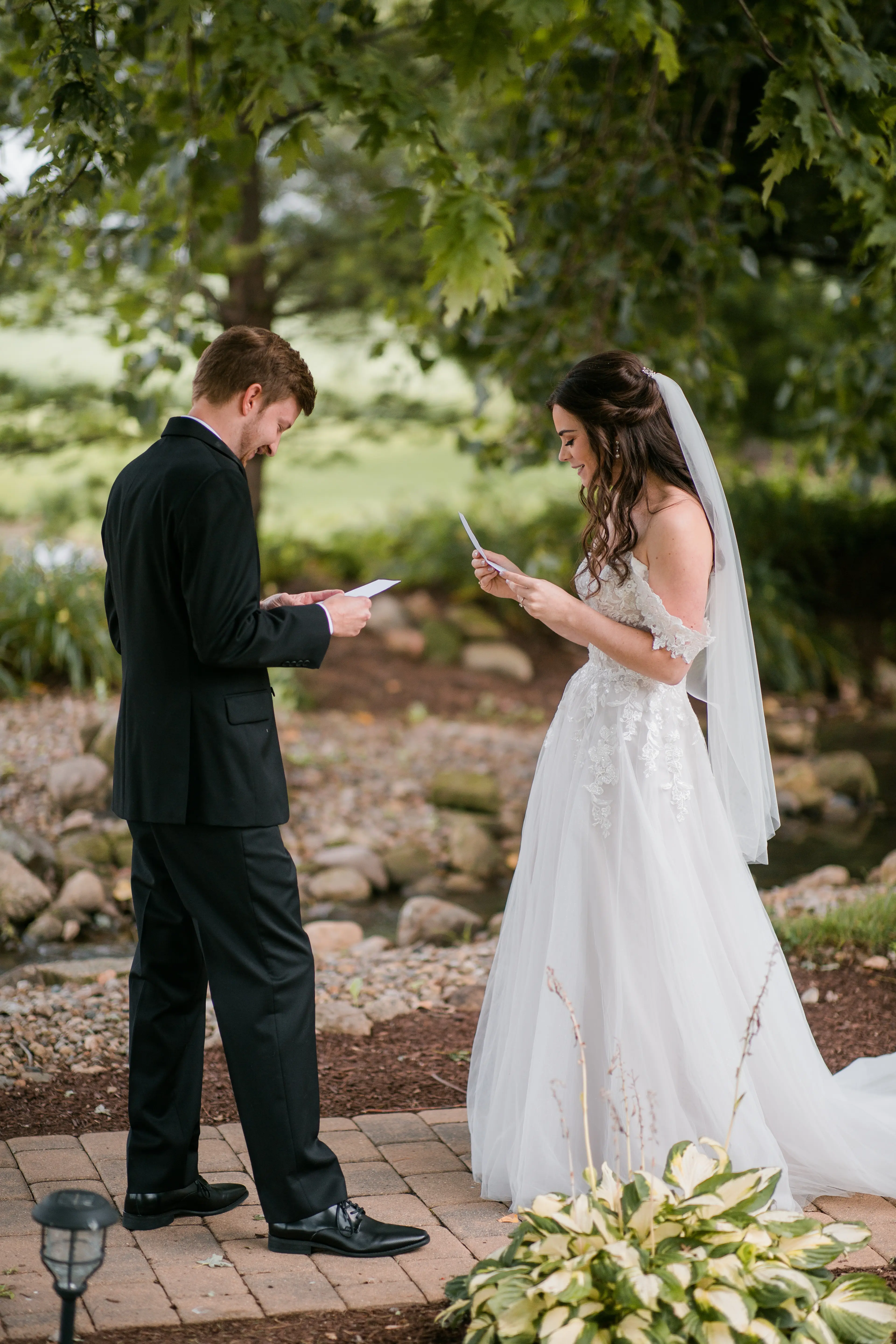 Groom With Bride Wearing A-Line Lace Wedding Dress With Customized Off The Shoulder Sleeves Stevie By Maggie Sottero