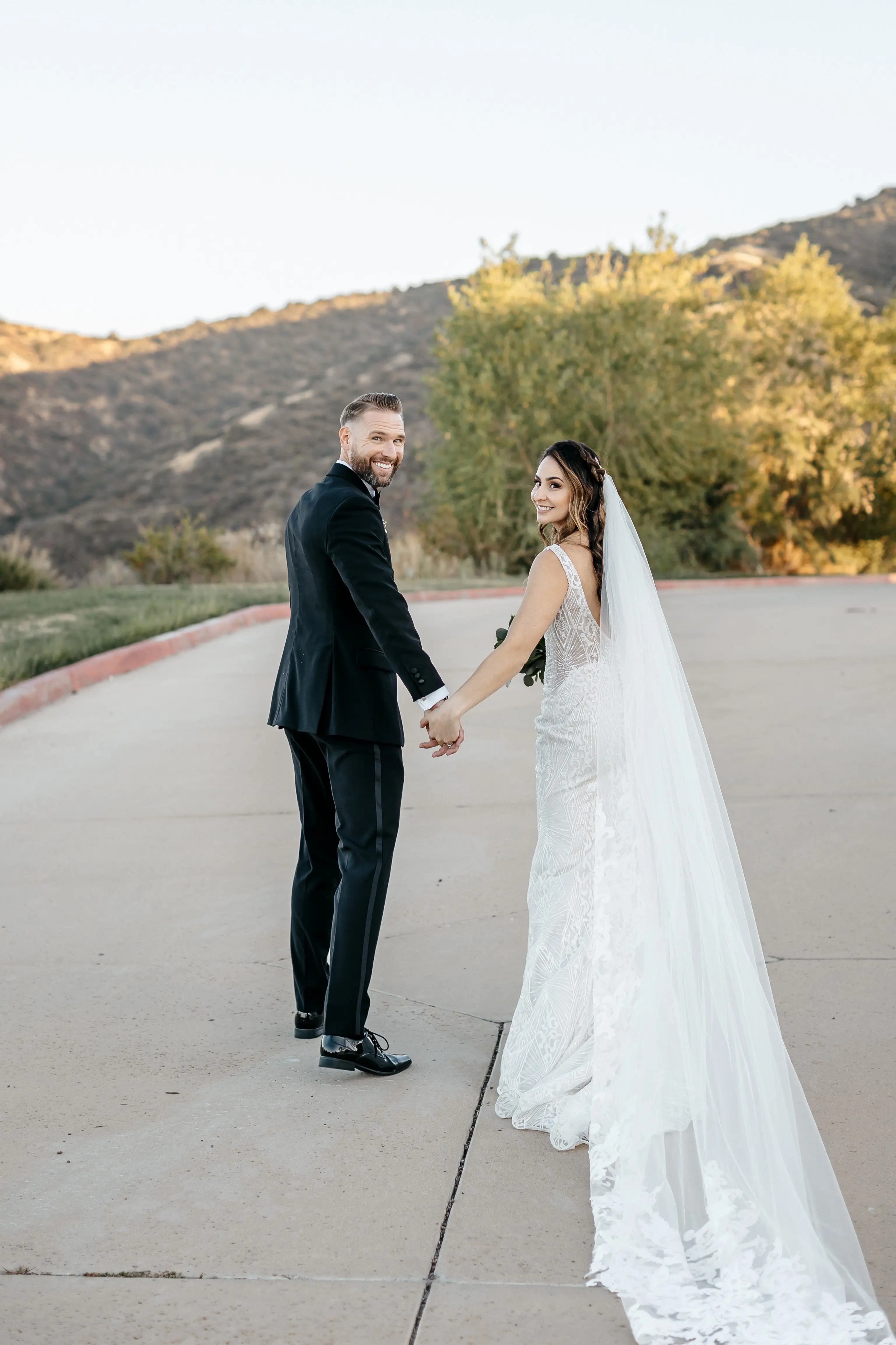 Groom With Bride Wearing Art Deco Wedding Dress Elaine By Maggie Sottero