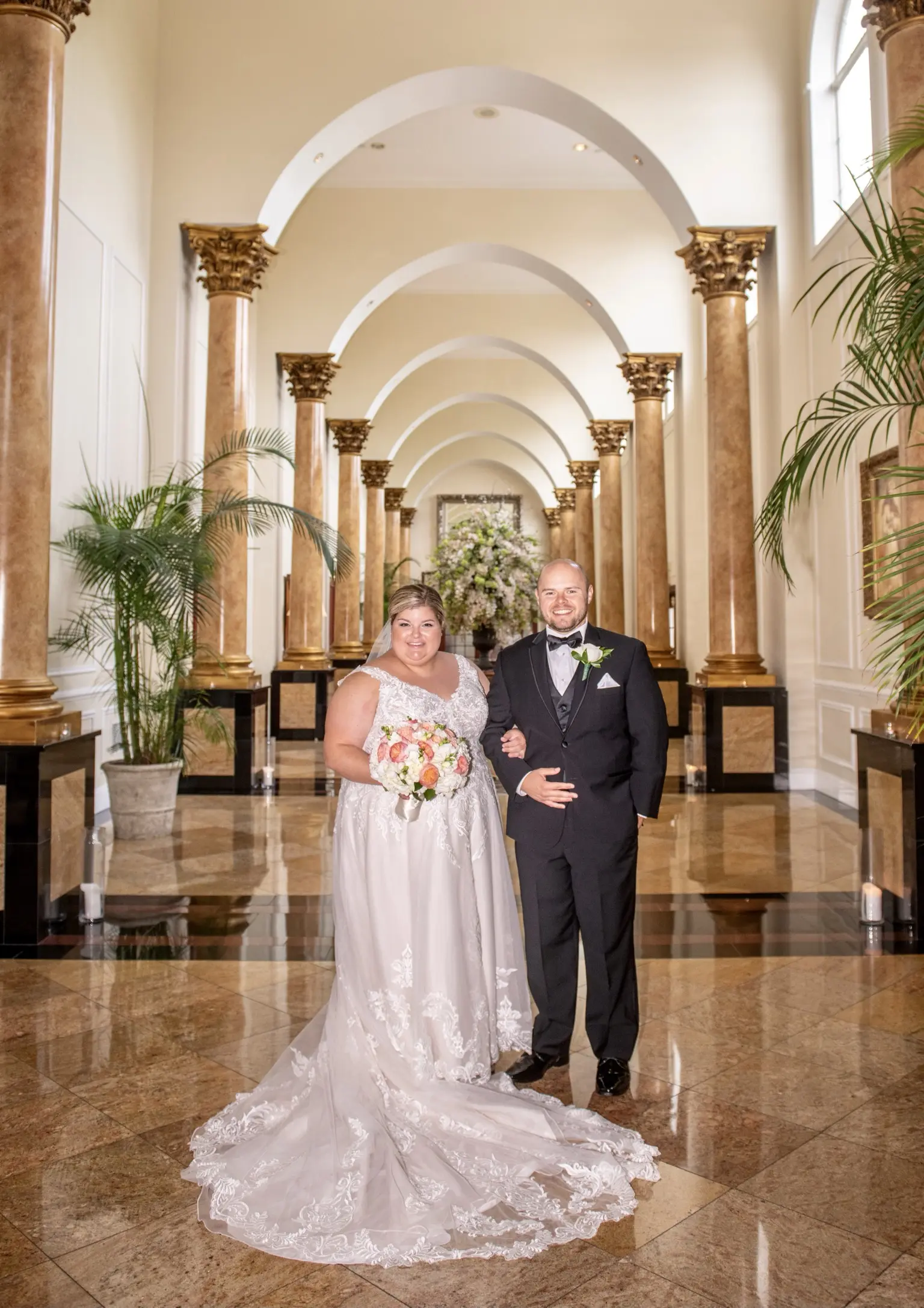 Bride wearing Lace A-line Wedding Dress called Trinity Lynette by Maggie Sottero and the groom