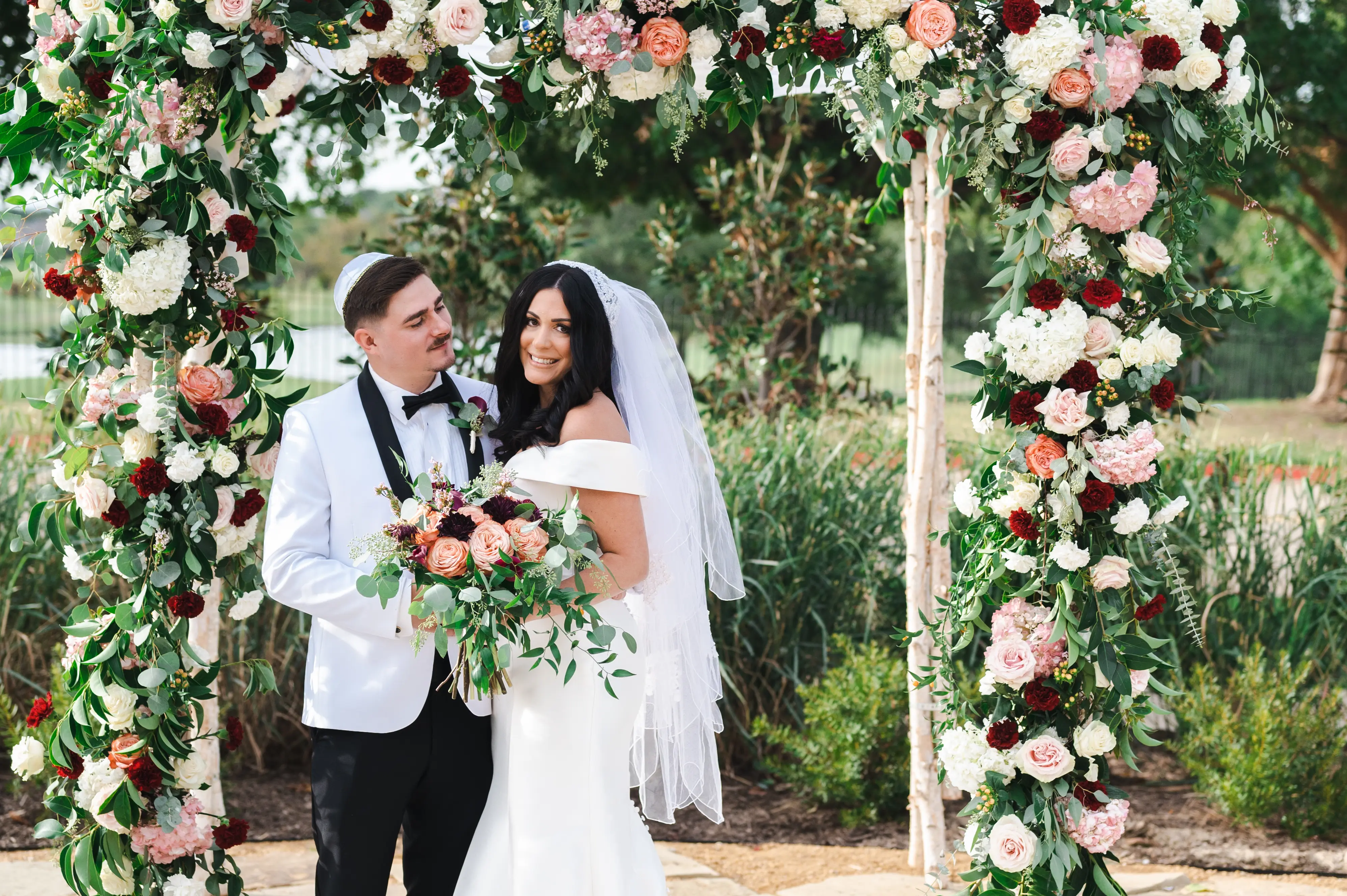 Groom With Bride Wearing Off-The-Shoulder Wedding Dress Josie By Rebecca Ingram
