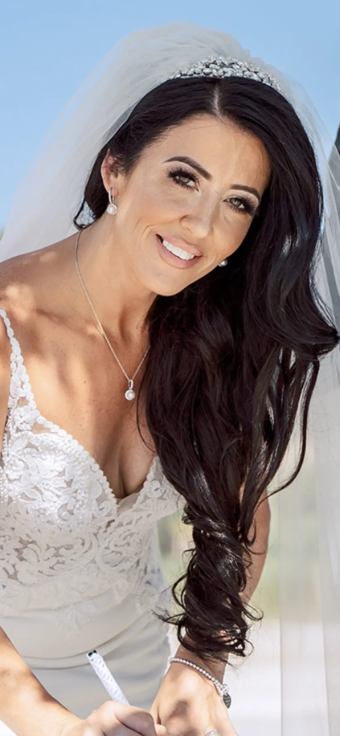 Bride Wearing Lace Spaghetti Strap Wedding Dress Nikki By Maggie Sottero
