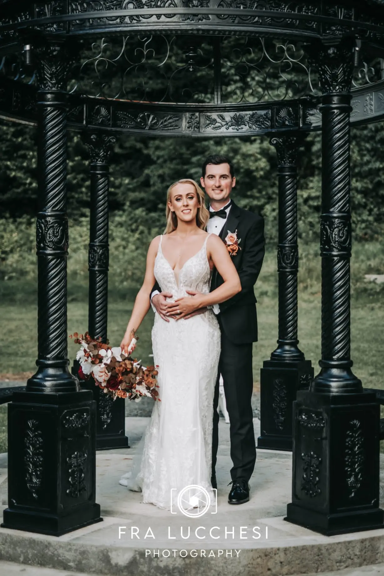 Bride wearing Bailey wedding dress by Sottero and Midgley with her husband