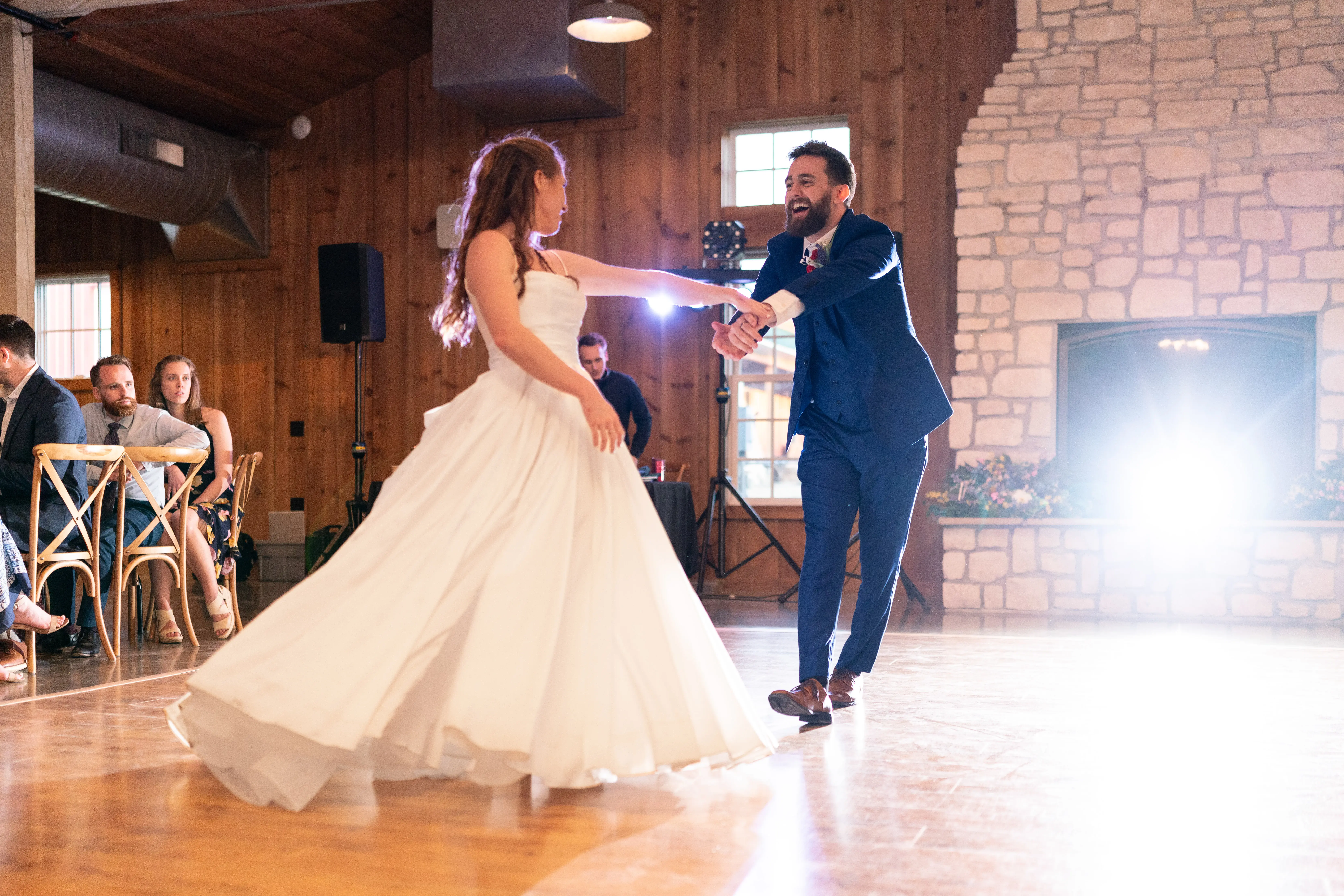 Bride wearing Scarlet by Maggie Sottero dancing with her husband