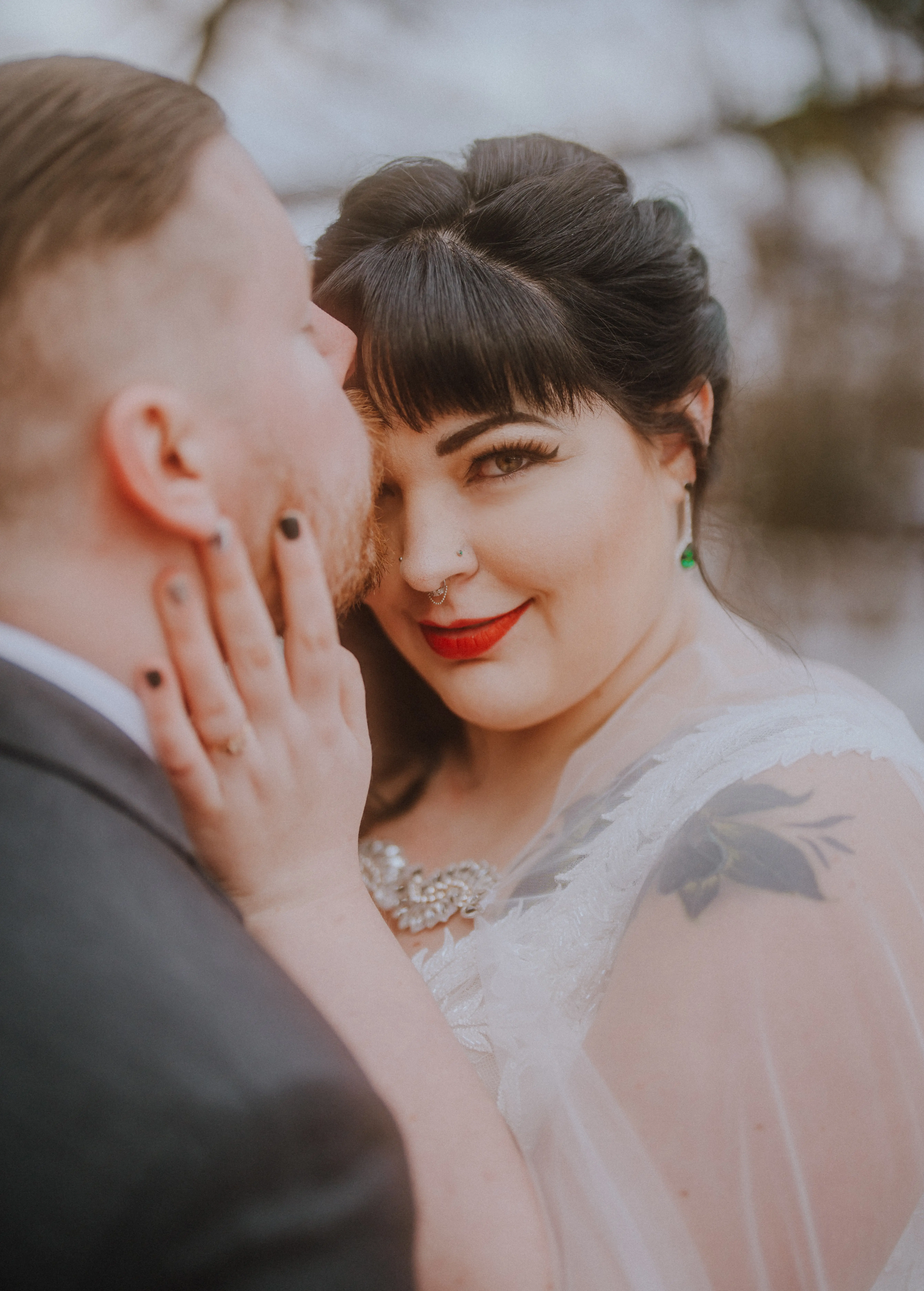 Real Bride in Cap-Sleeve Mermaid Wedding Dress with Lace Motifs and eep V-Neckline Called Joss by Sottero & Midgley