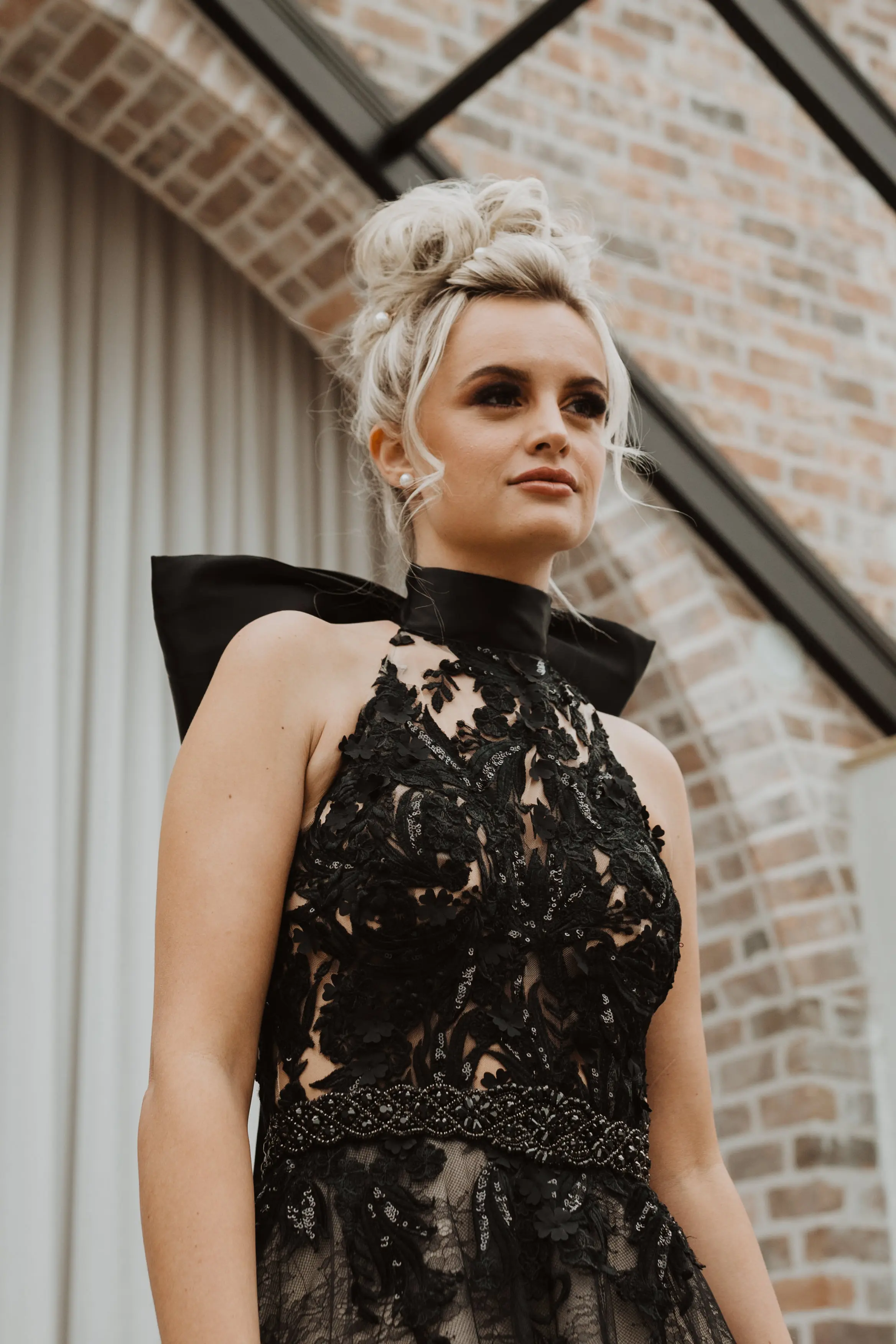 Real Bride in Beautiful Black Ball Gown Wedding Dress with Contrasting Layers of Tulle, Lace Motifs, and Chantilly Lace Called Zander by Sottero & Midgley