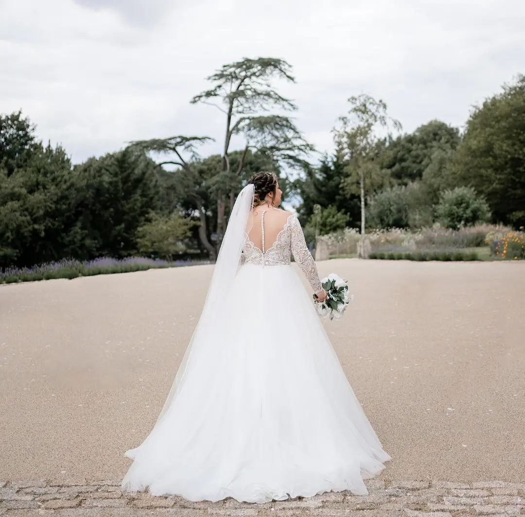 Bride From Back Wearing Wedding Gown Called Mallory Dawn by Maggie Sottero