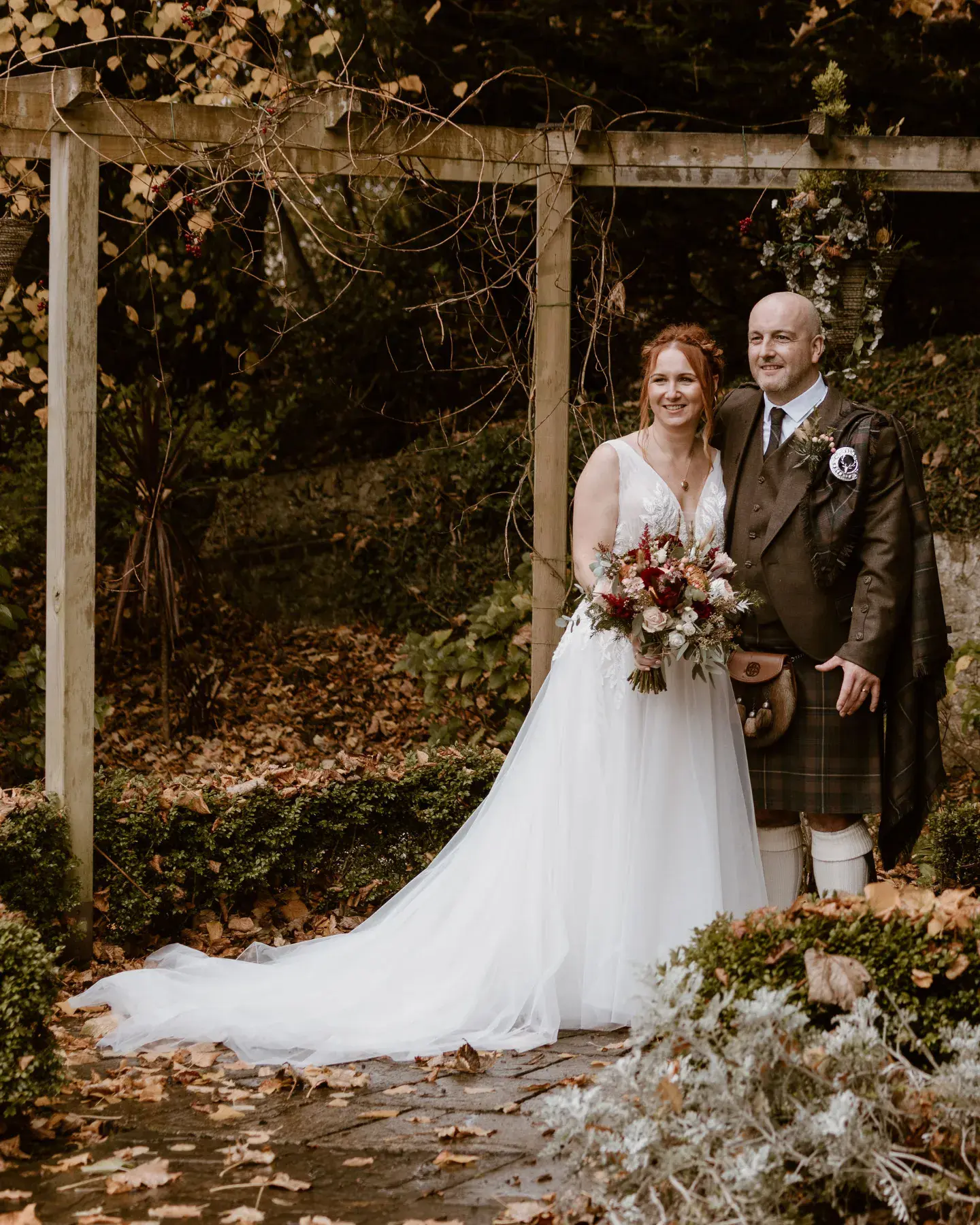 Real Bride in Nature-Inspired Tulle Wedding Dress with Plunging V-Neckline Called Jenessa by Rebecca Ingram