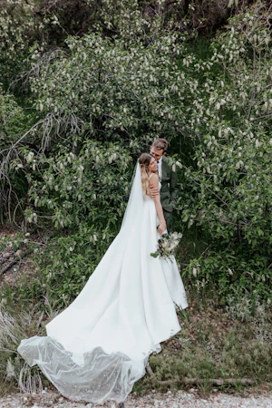 Bride With Groom In Satin Wedding Dress Called Selena By Maggie Sottero