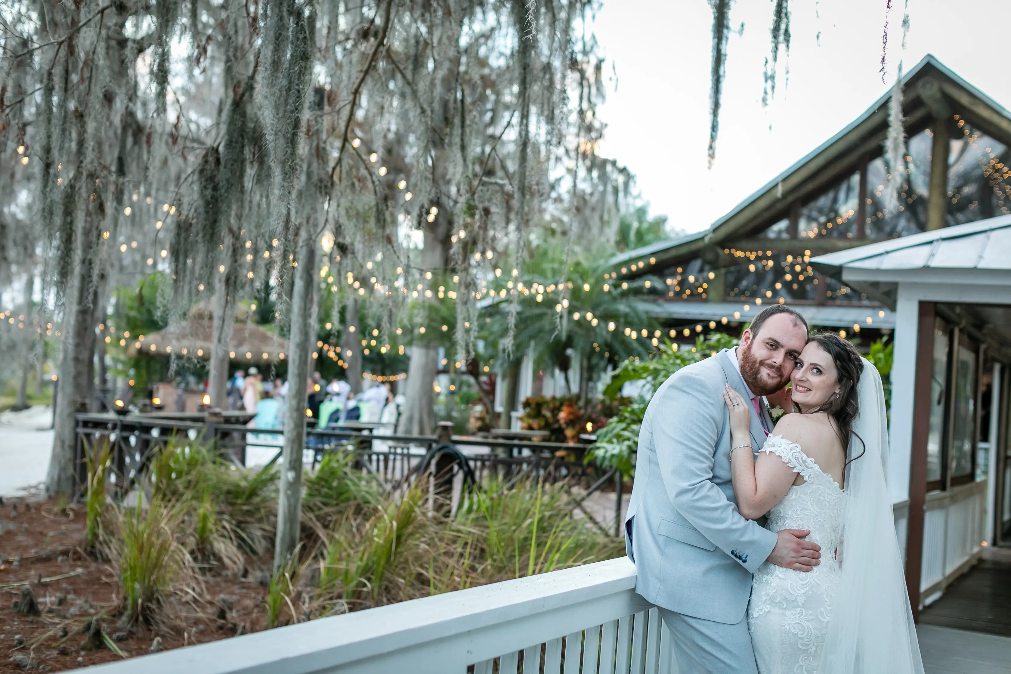 Bride In Off The Shoulder Lace Wedding Dress Called Edison By Maggie Sottero With Groom