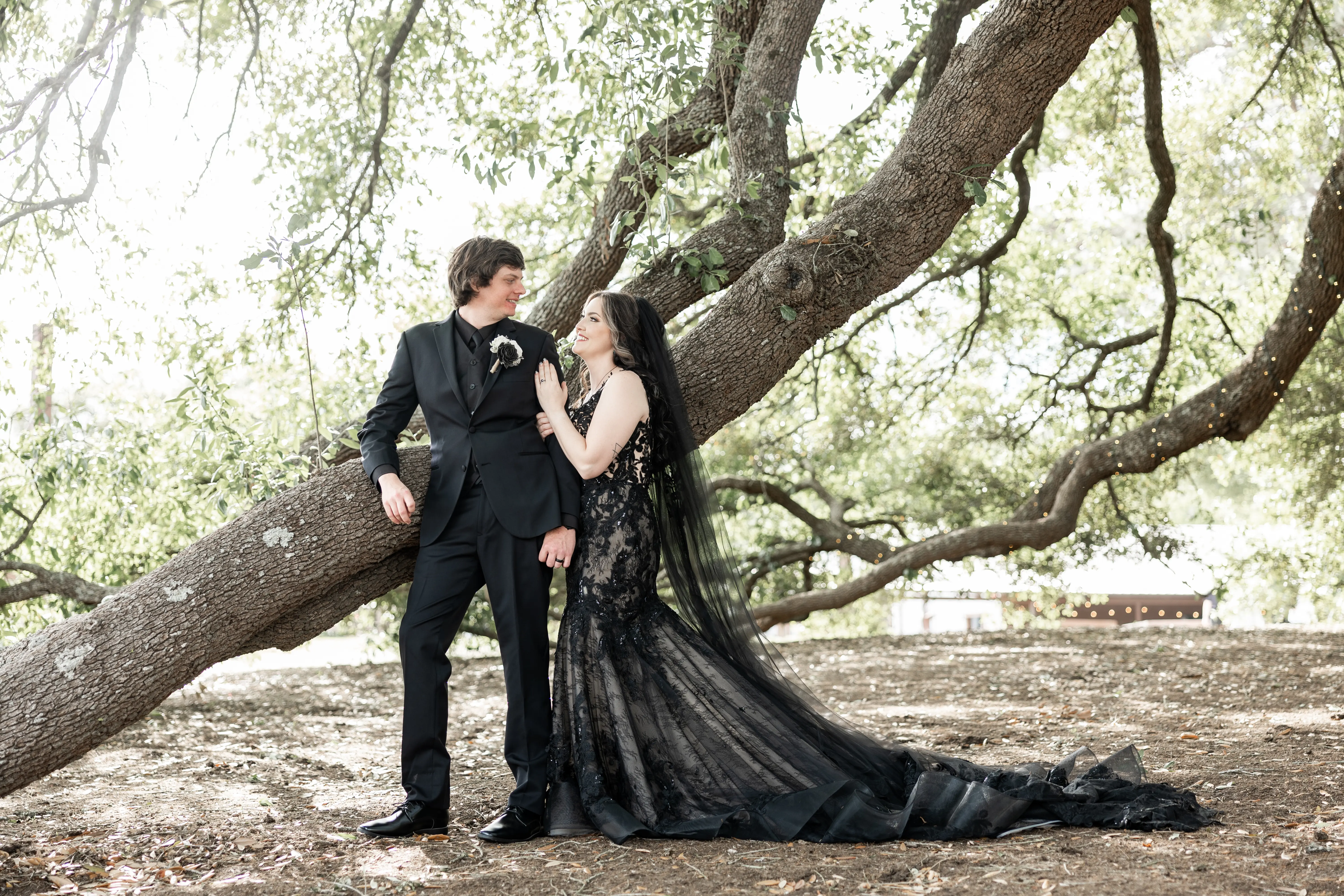 Bride wearing Zander Lane by Sottero and Midgley with her husband