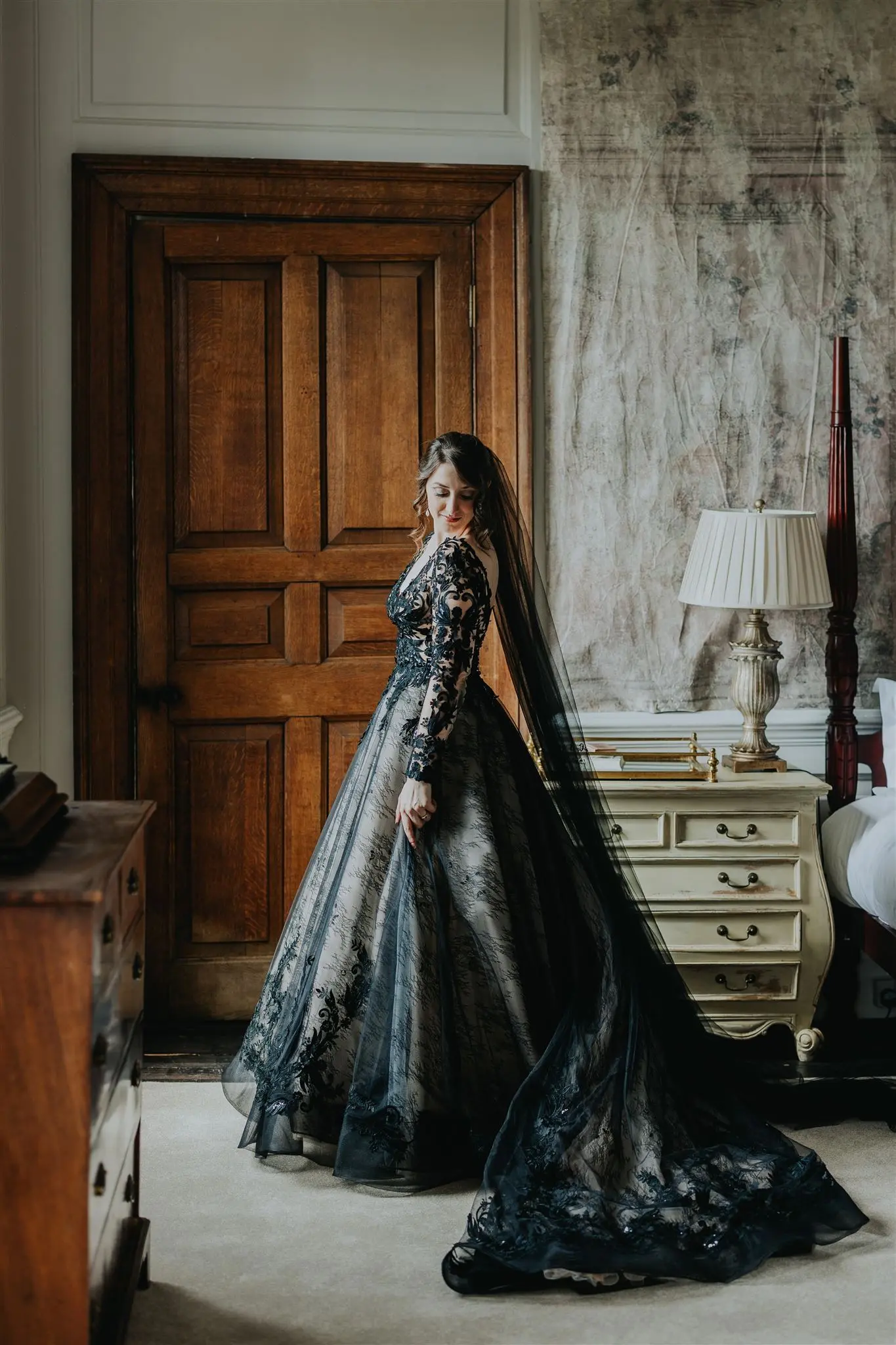 Real Bride in Chic Black Ball Gown Wedding Dress with Contrasting Layers of Tulle and Lace Called Zander by Sottero & Midgley
