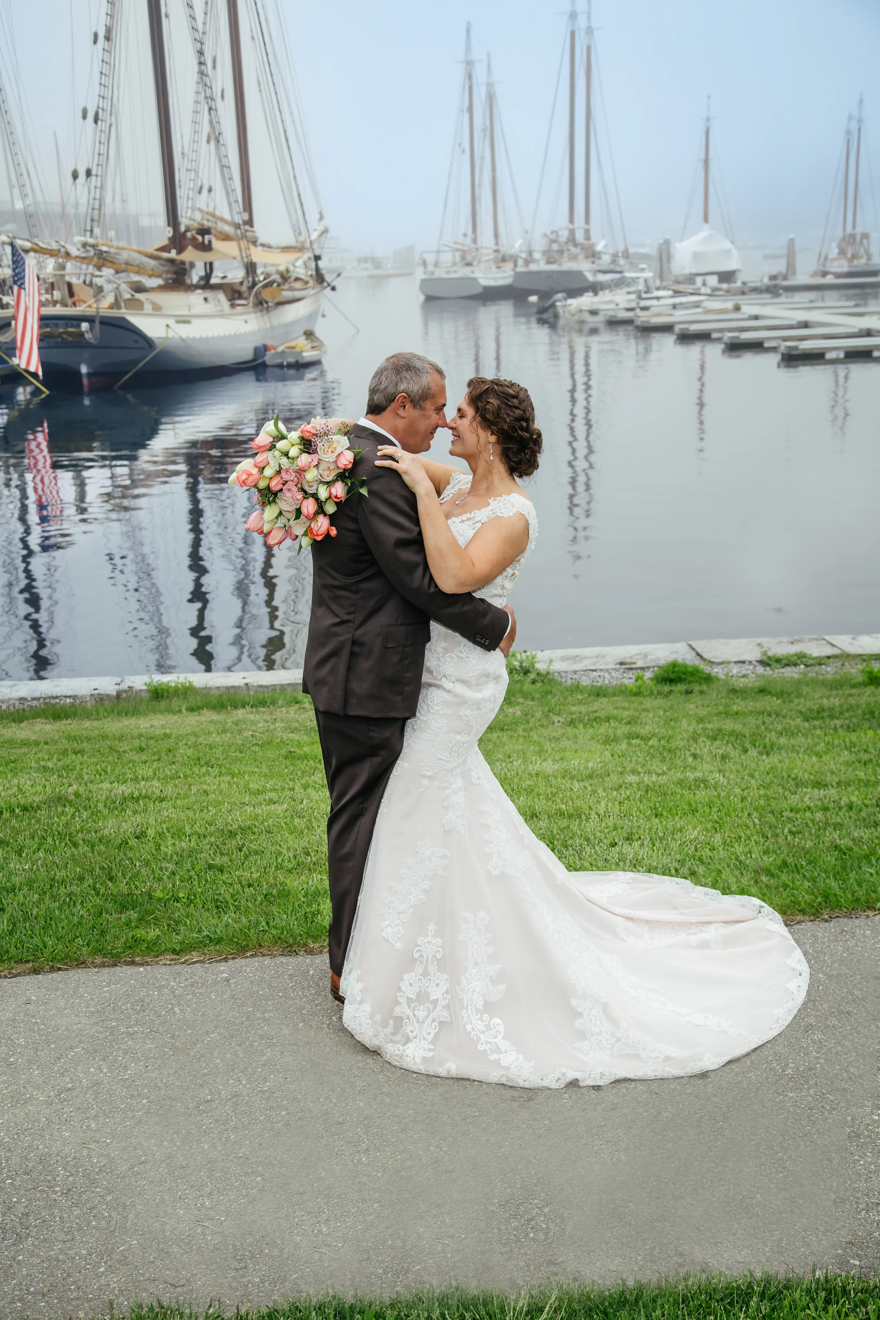 Groom With Bride Wearing Lace Fit-And-Flare Daphne By Rebecca Ingram