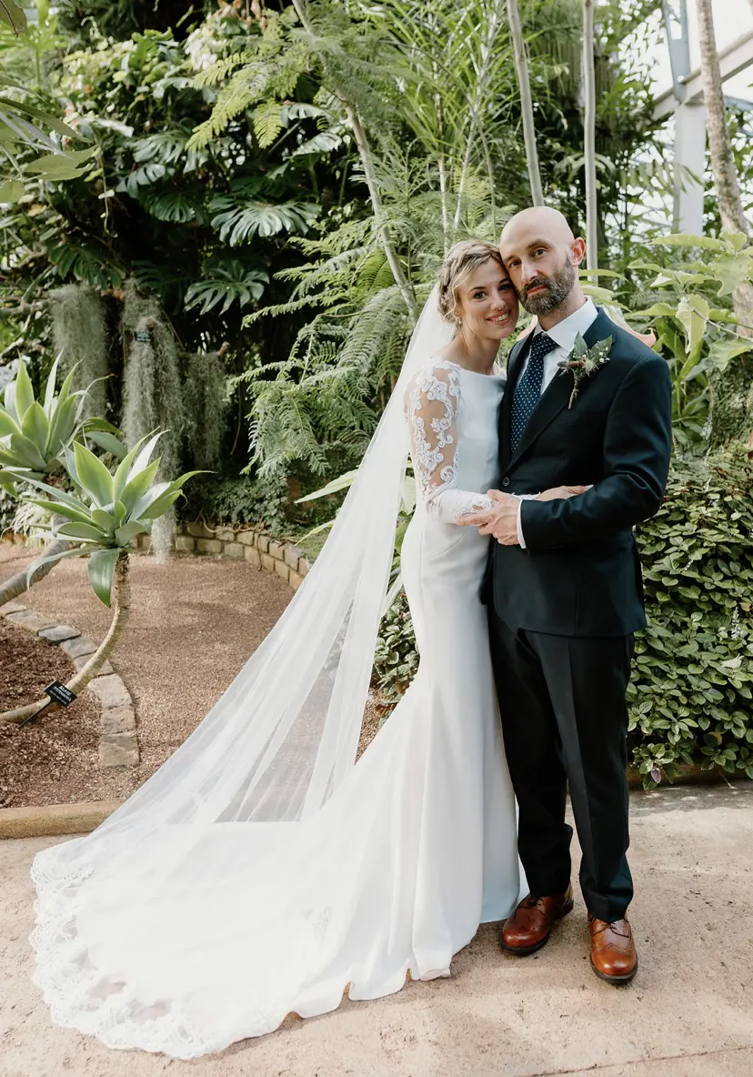 Bride wearing Bethany wedding dress by Rebecca Ingram with her husband