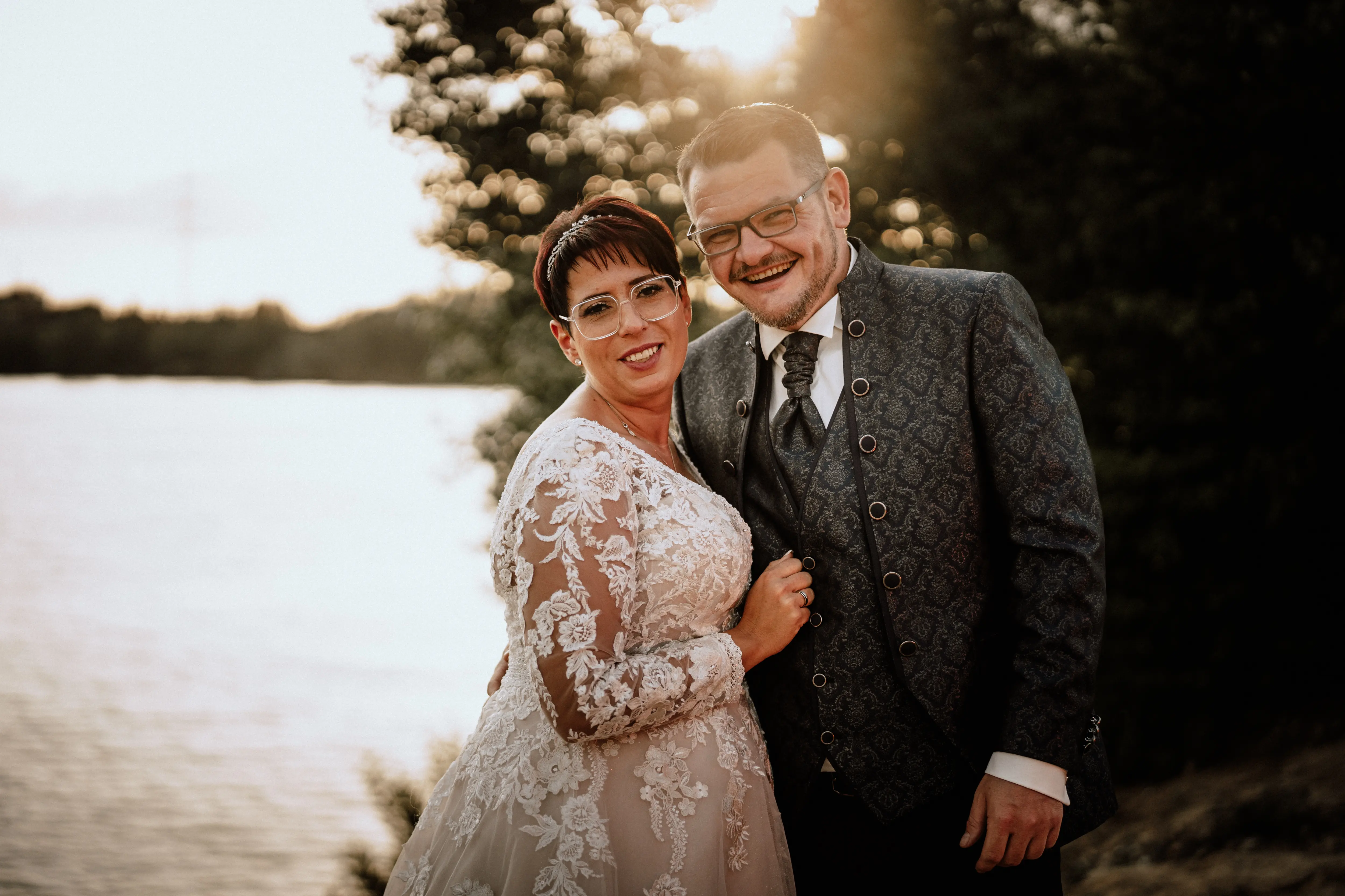 Bride in Long Sleeve Ivory Wedding Dress Raphael with Groom
