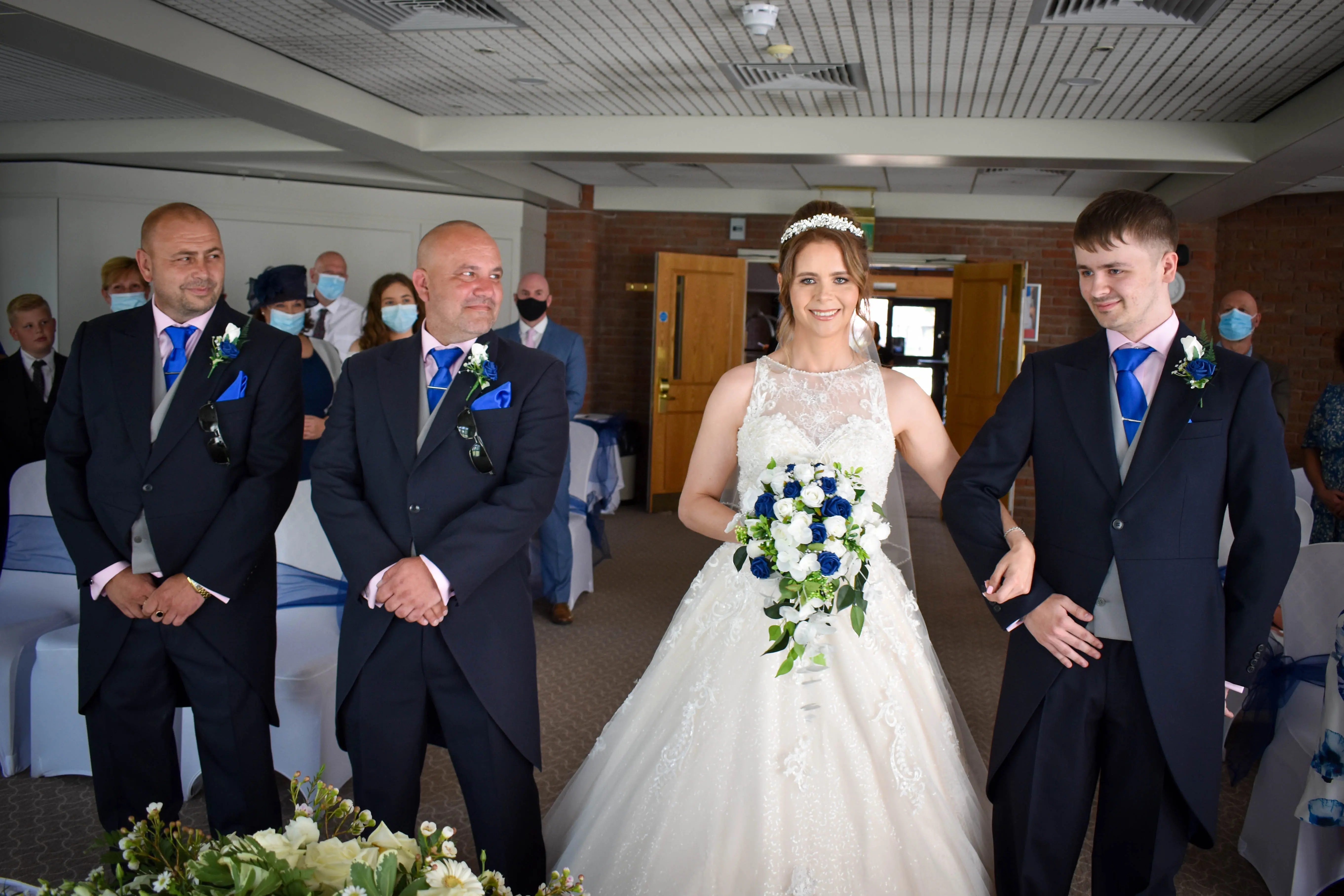 Bride wearing a lace and tulle ballgown wedding dress