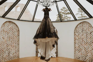 Real Bride's Beautiful Black Ball Gown Wedding Dress with Contrasting Layers of Tulle, Lace Motifs, and Chantilly Lace Called Zander by Sottero & Midgley
