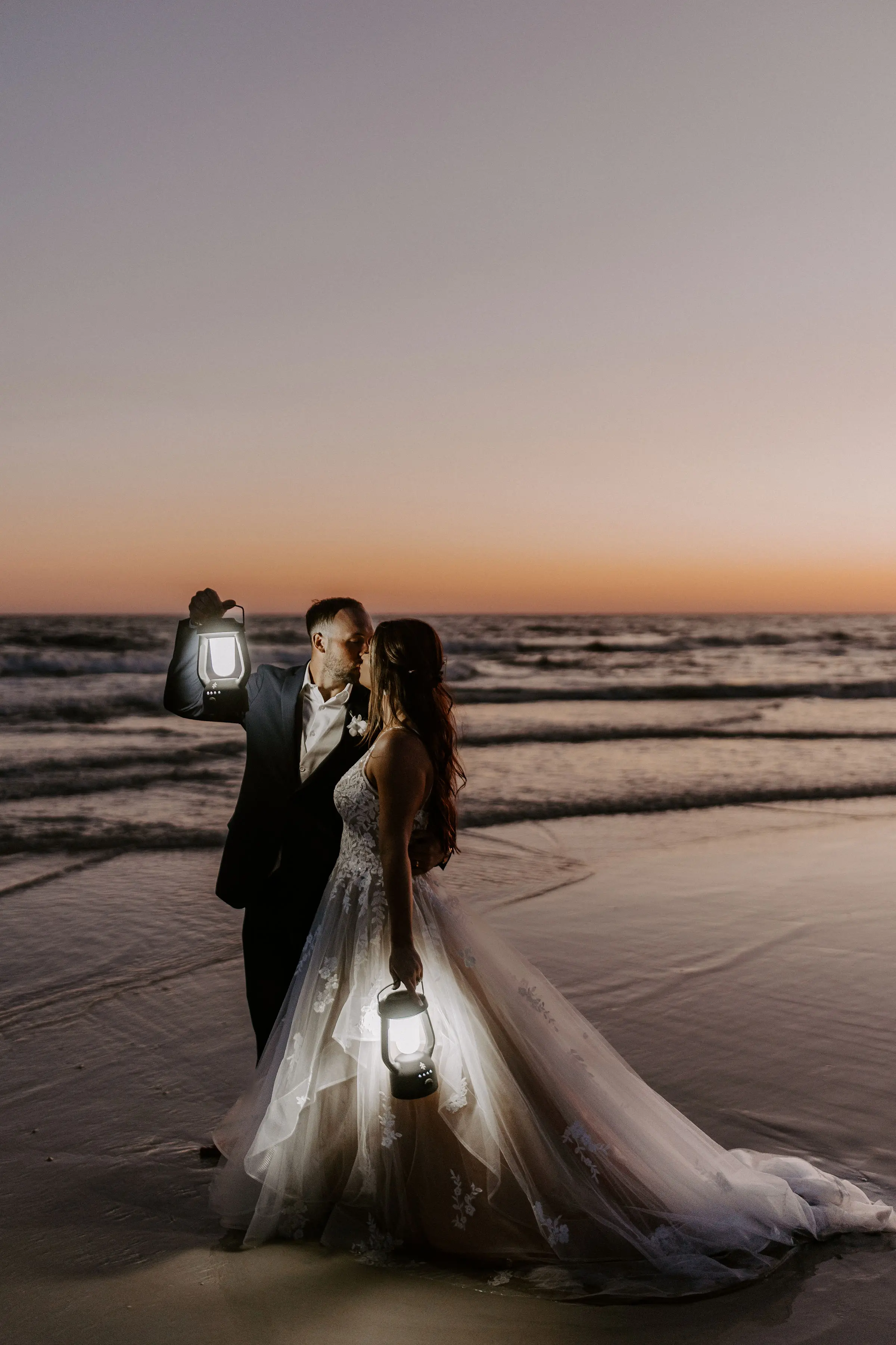 Real Bride wearing A-Line wedding dress with tiered ruffled called Lettie by Rebecca Ingram.