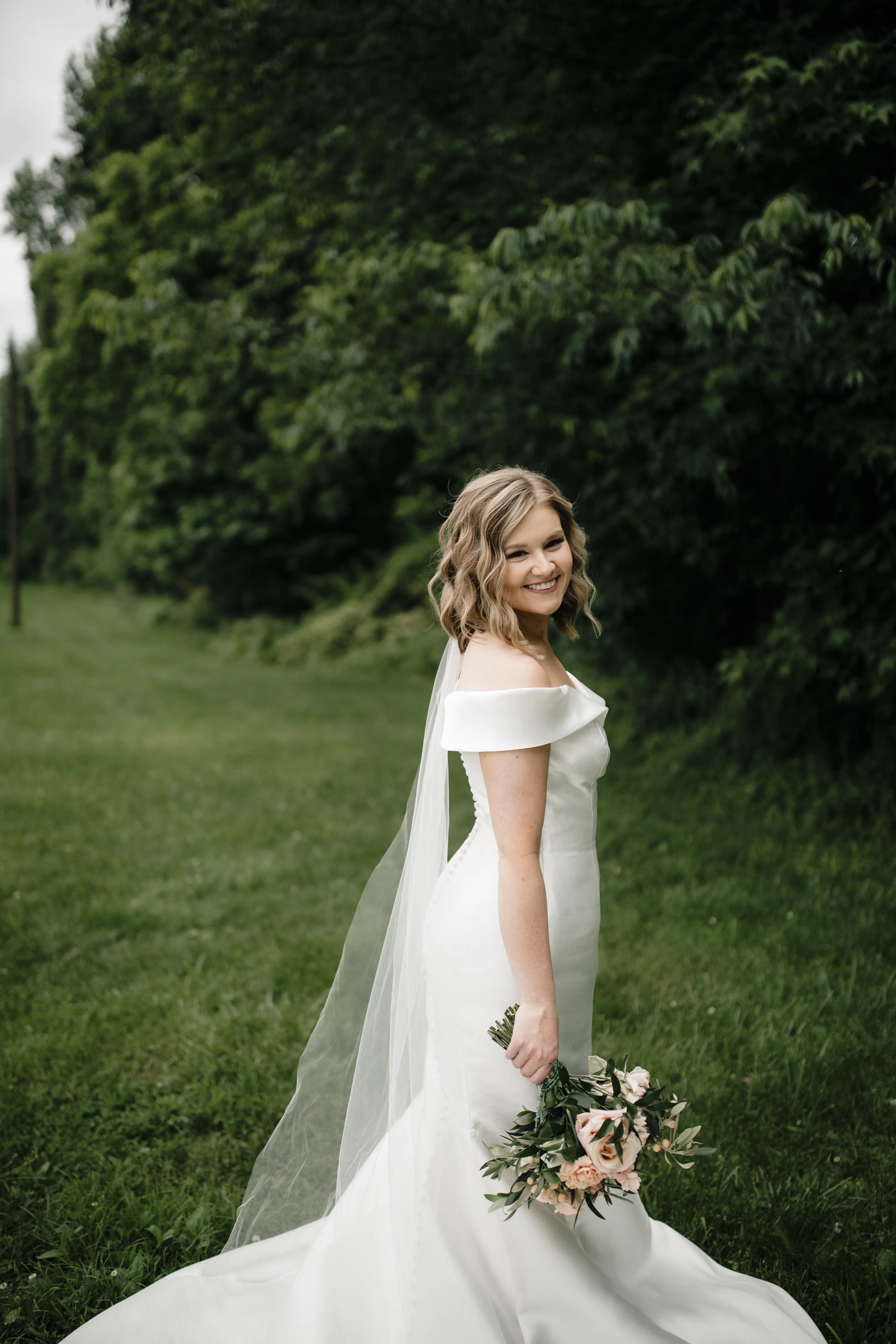 Bride In Satin Wedding Dress Called Josie By Rebecca Ingram