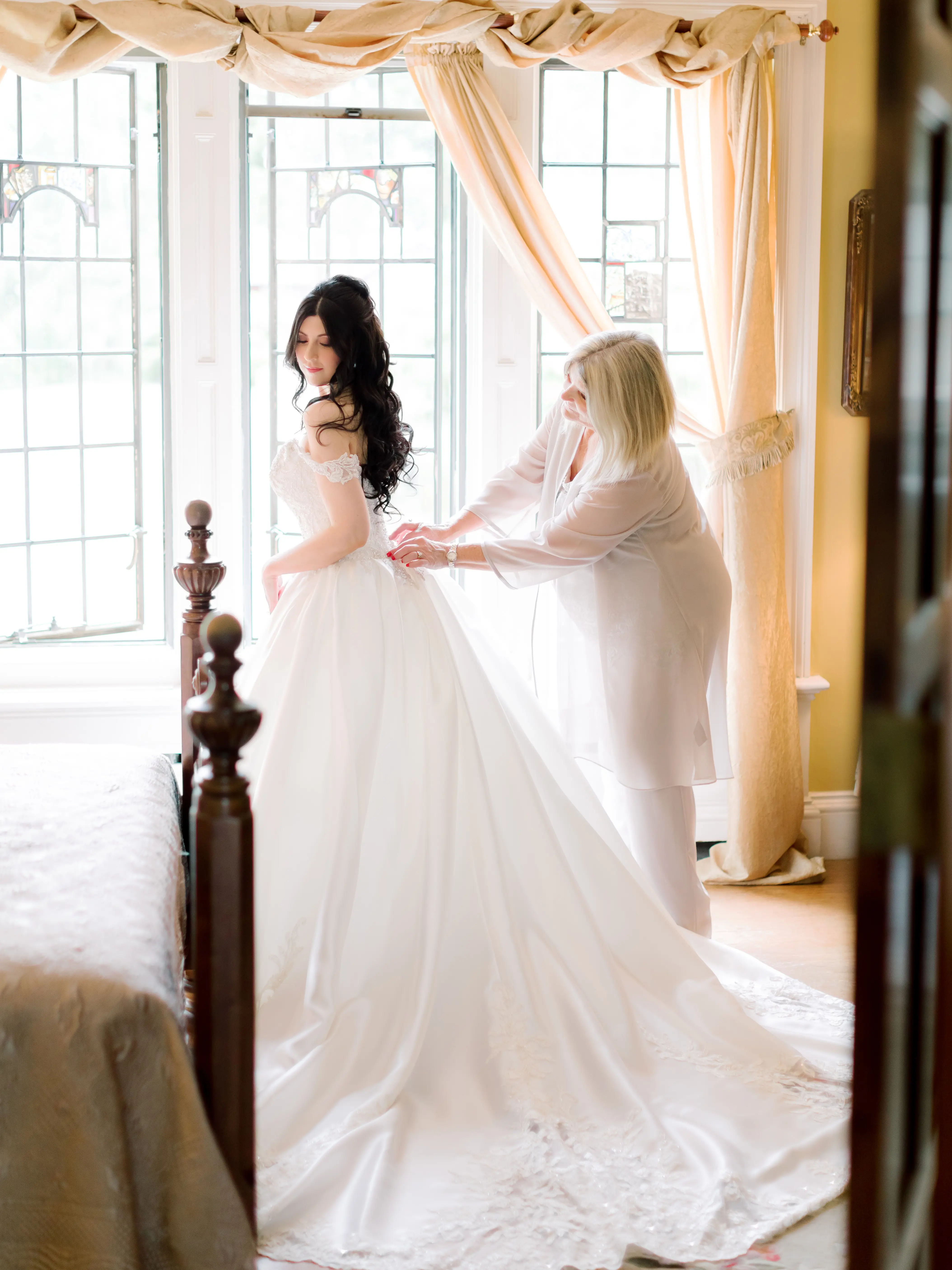 Bride wearing off the shoulder luxury ballgown wedding dress