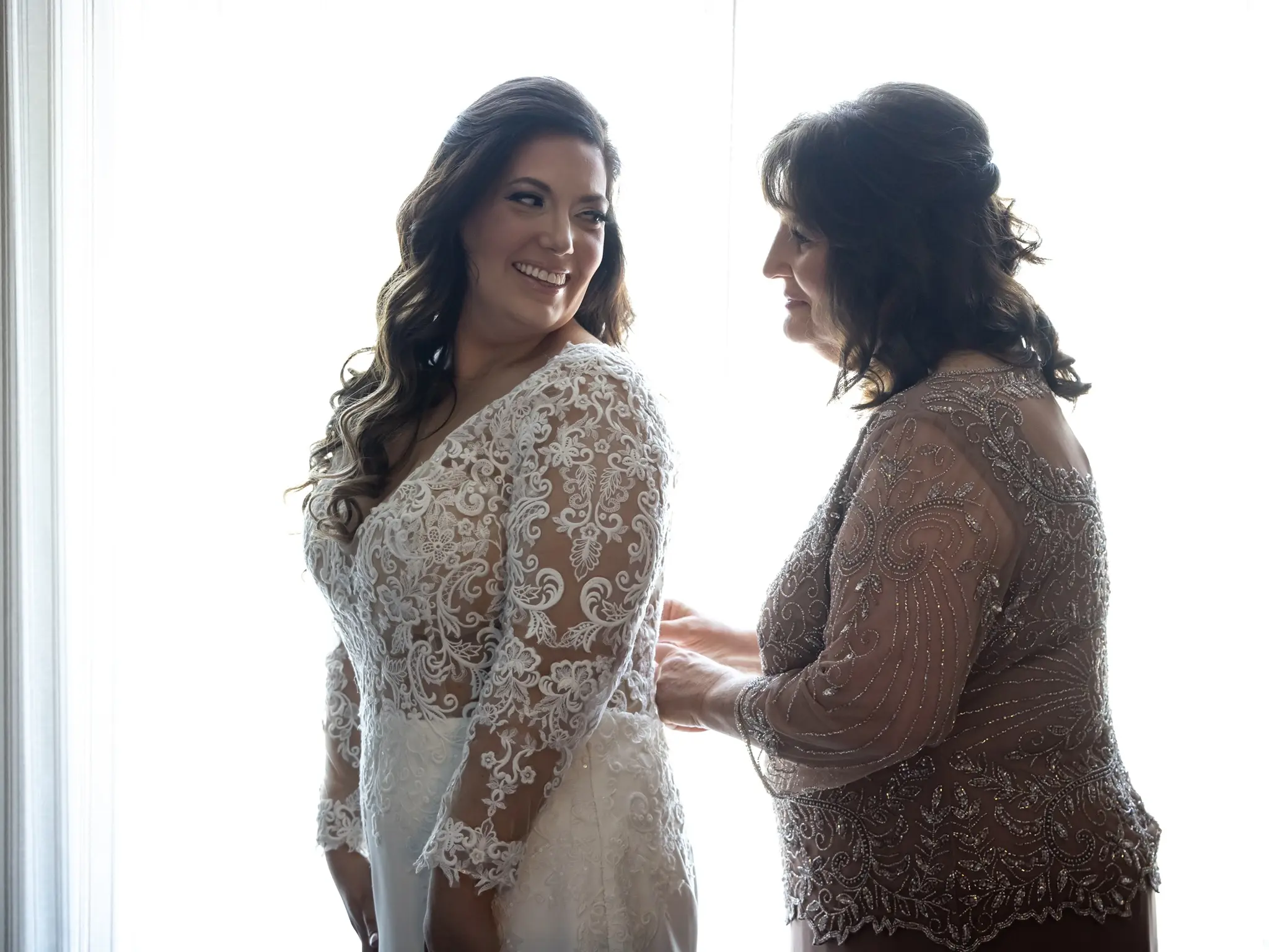 Bride Wearing Long Sleeve Sheath Wedding Dress Althea By Maggie Sottero