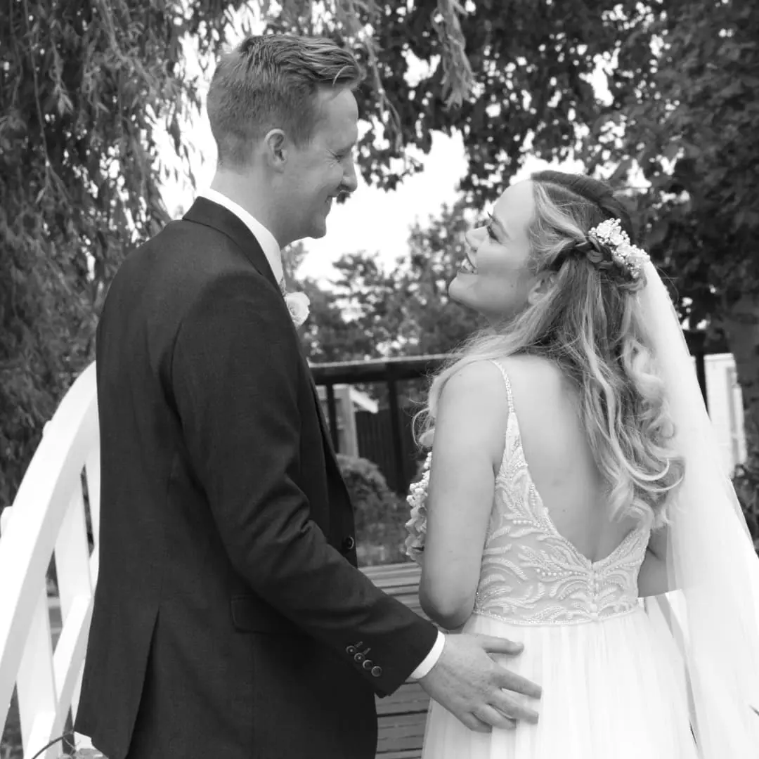 Groom With Bride Wearing Relaxed Boho A-Line Wedding Dress Charlene By Maggie Sottero