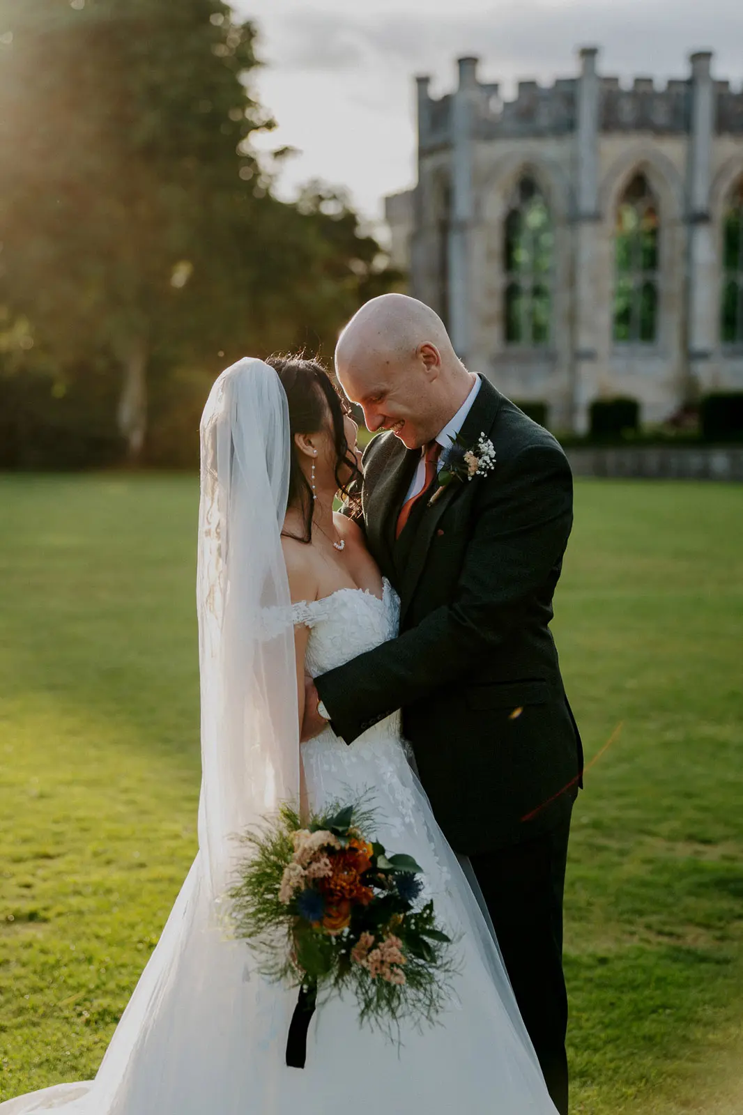 Bride wearing Harlem by Maggie Sottero with her husband