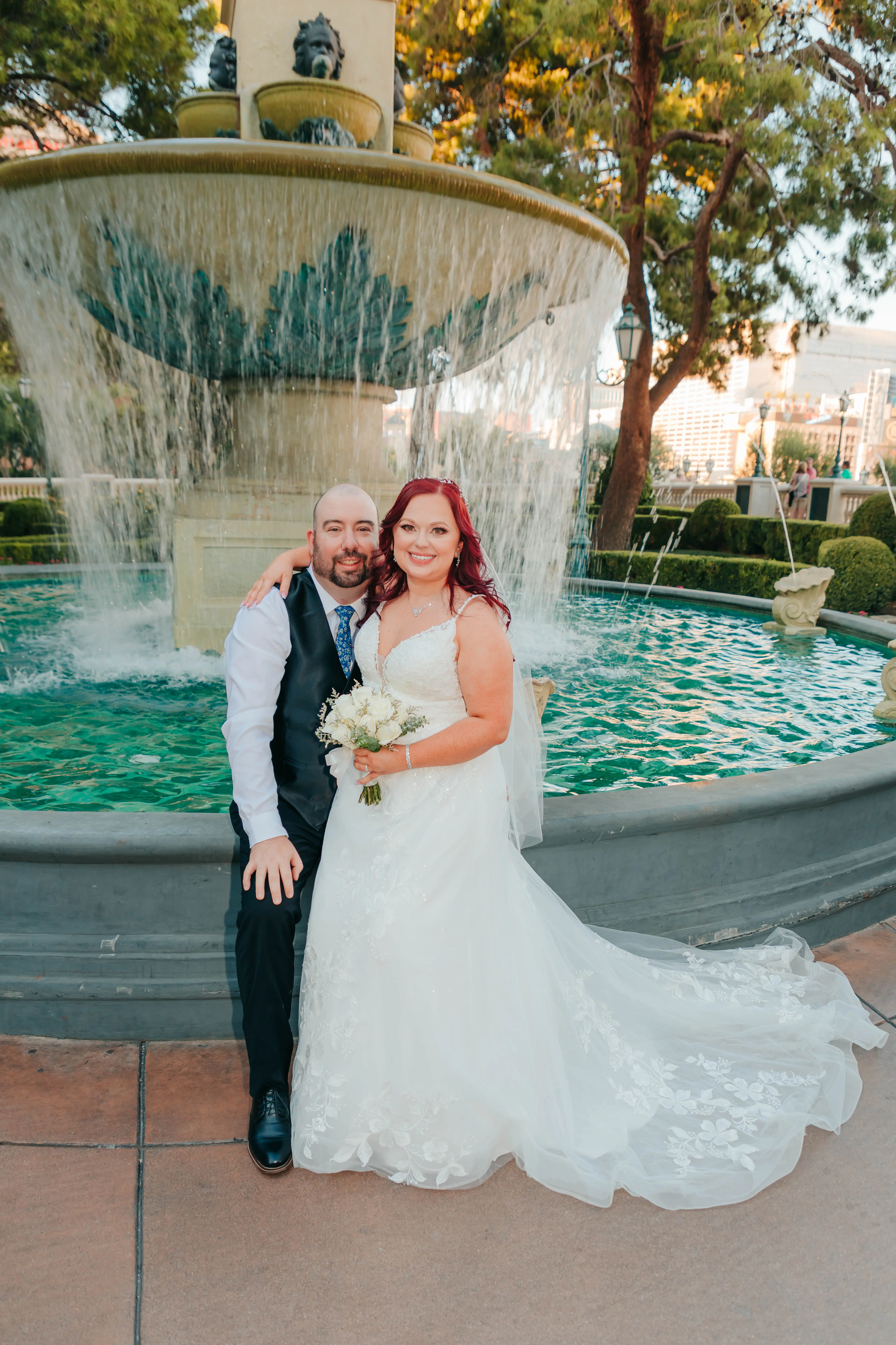 Groom and Bride at a Las Vegas Wedding Wearing Lace Ballgown Called Ellen by Rebecca Ingram