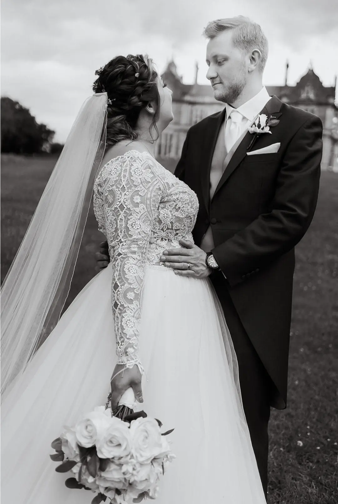 Bride With Groom Wearing Wedding Gown Called Mallory Dawn by Maggie Sottero